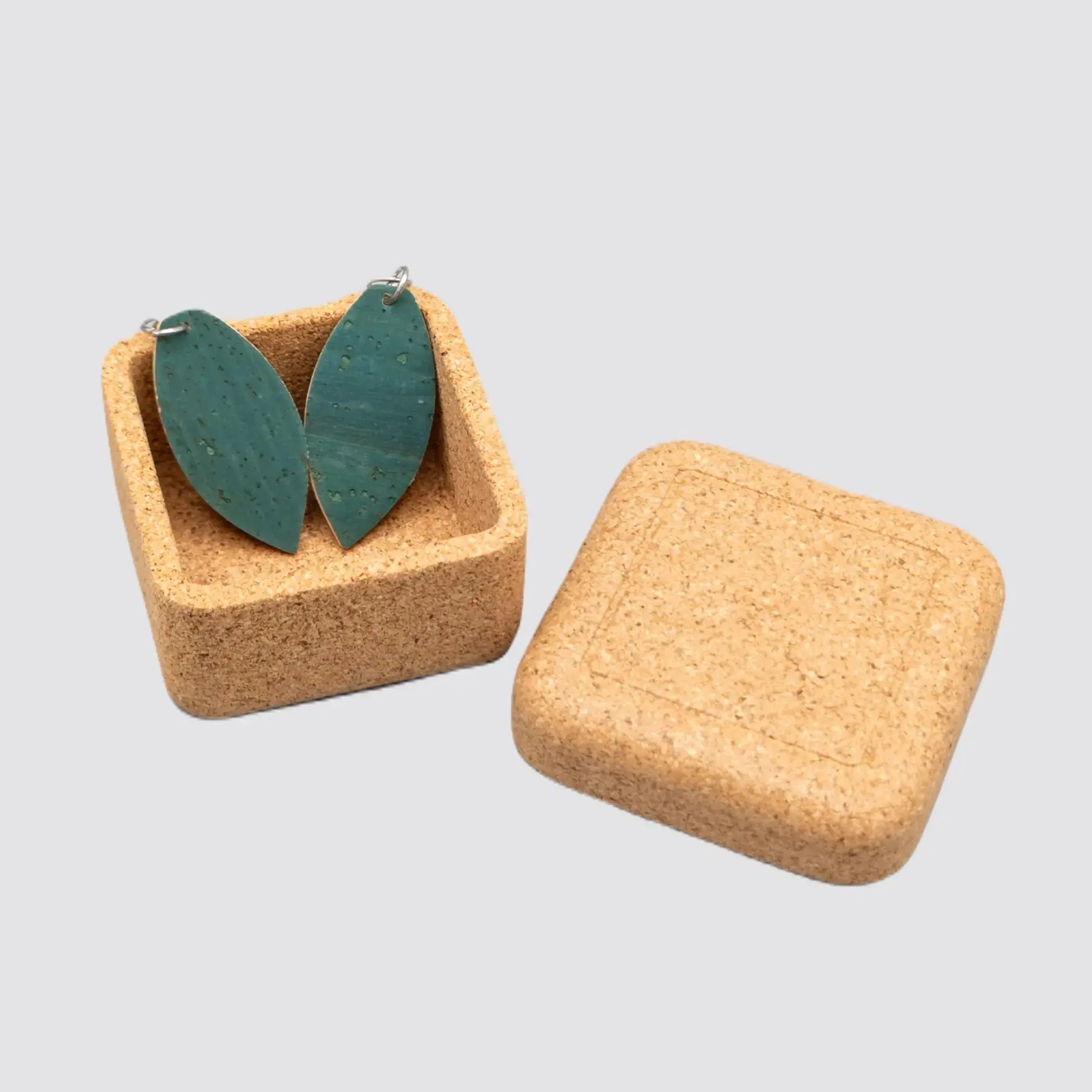 Artisanal cork earrings with a reusable gift box for sustainable fashion lovers.