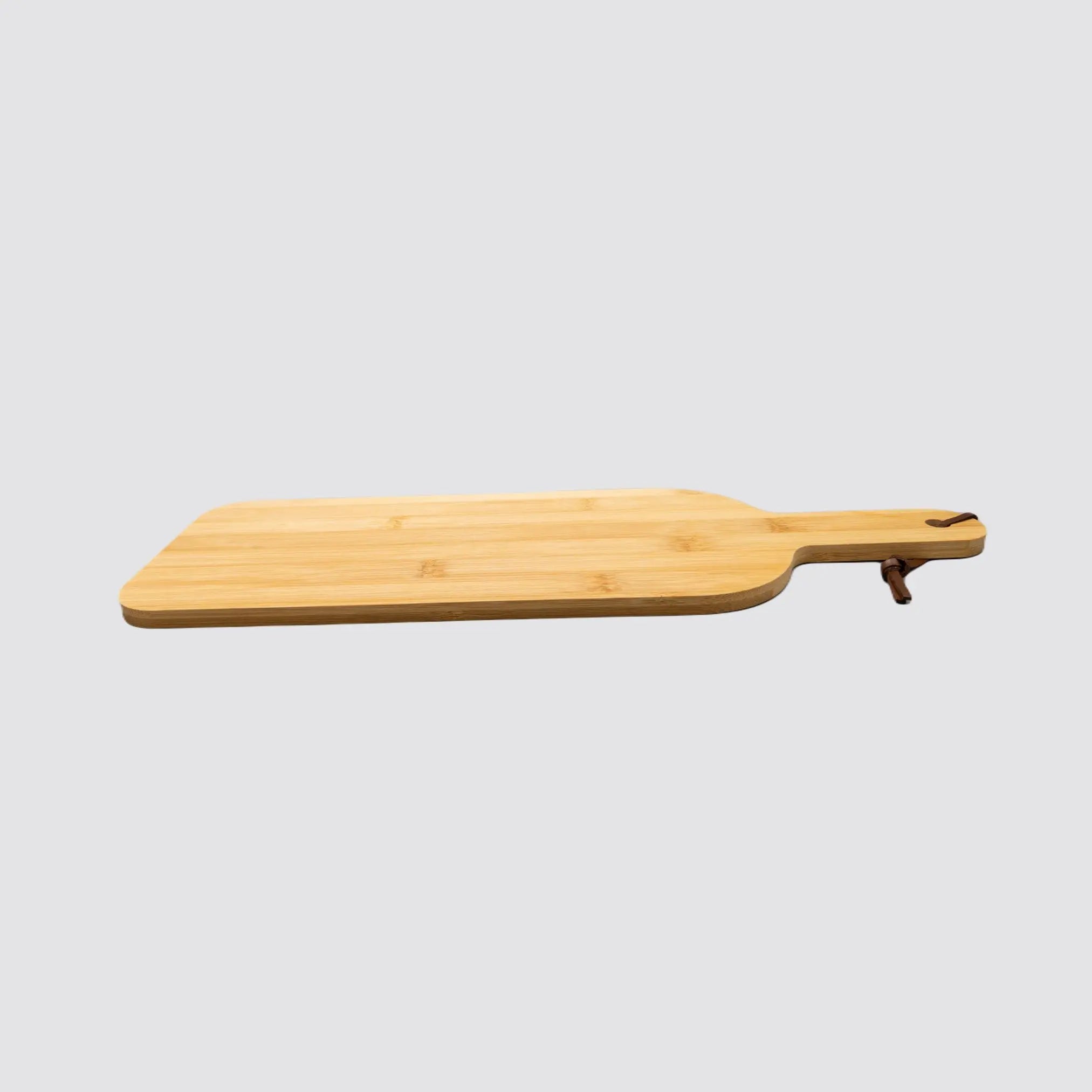 Side profile of the bamboo cutting board, highlighting its durable design.