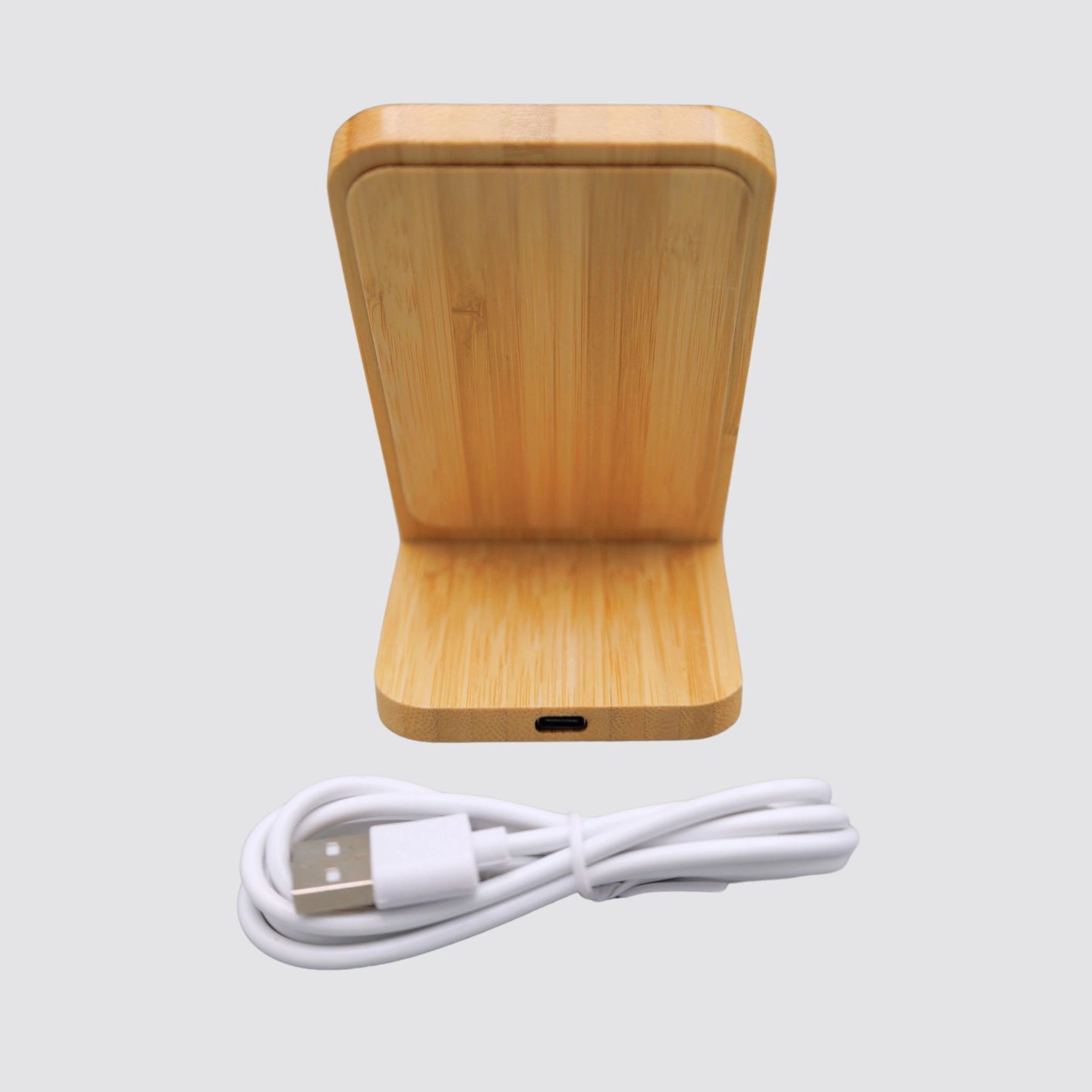 Bamboo Wireless Charger with included charging cable, highlighting its complete set, on a plain background.