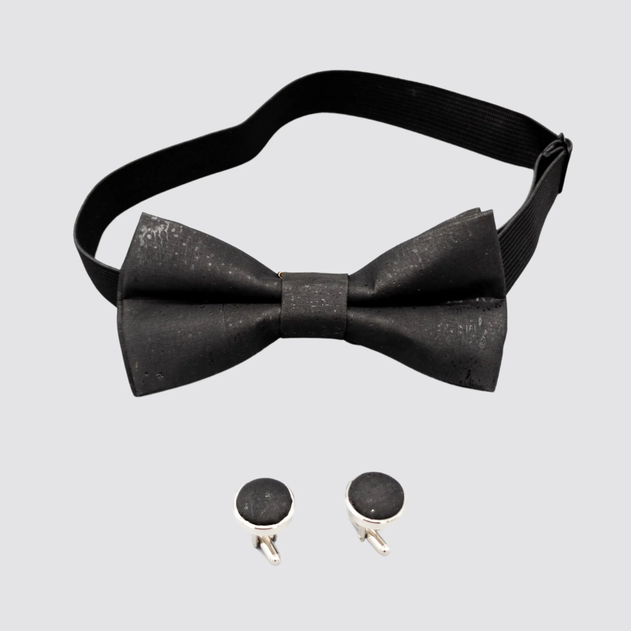 Black cork bow tie and cufflink set for sophisticated eco-friendly style.