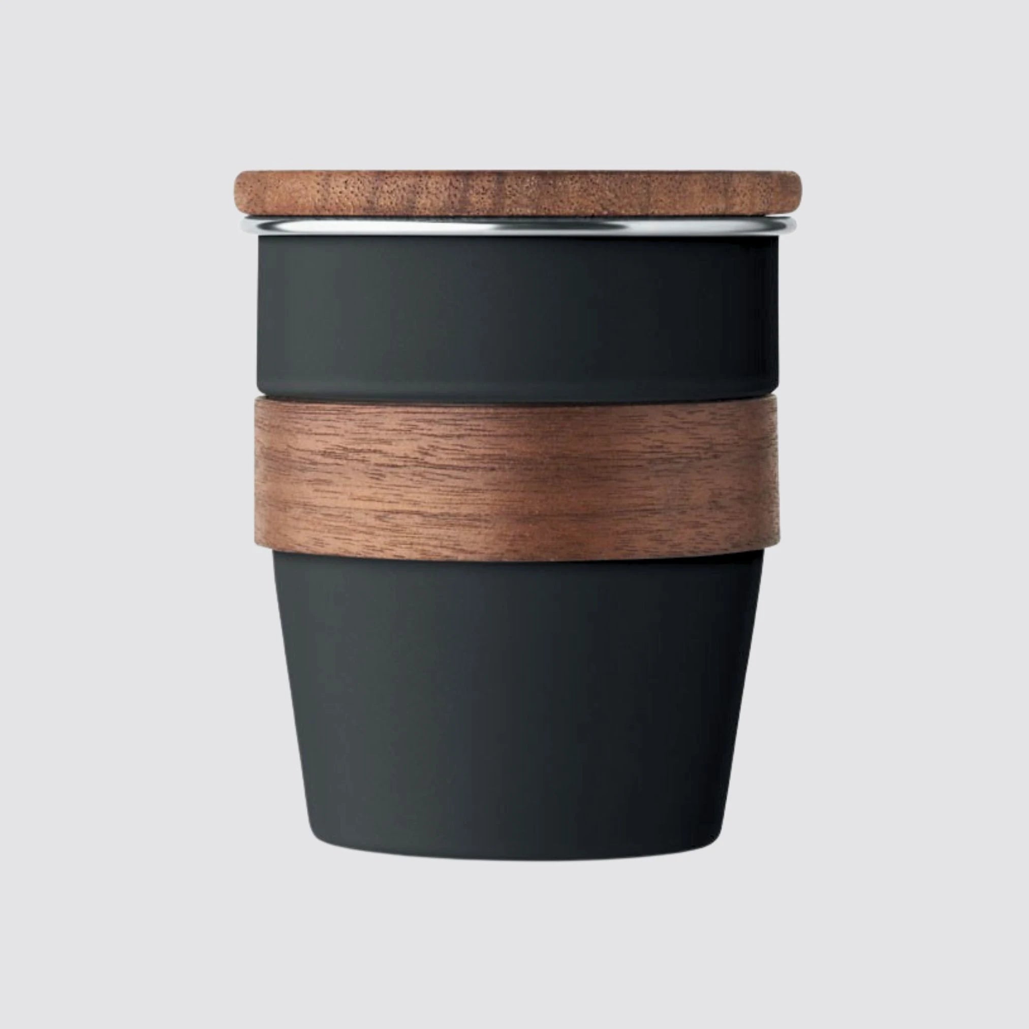 Black tumbler with a walnut lid and handle, featuring an eco-friendly design.