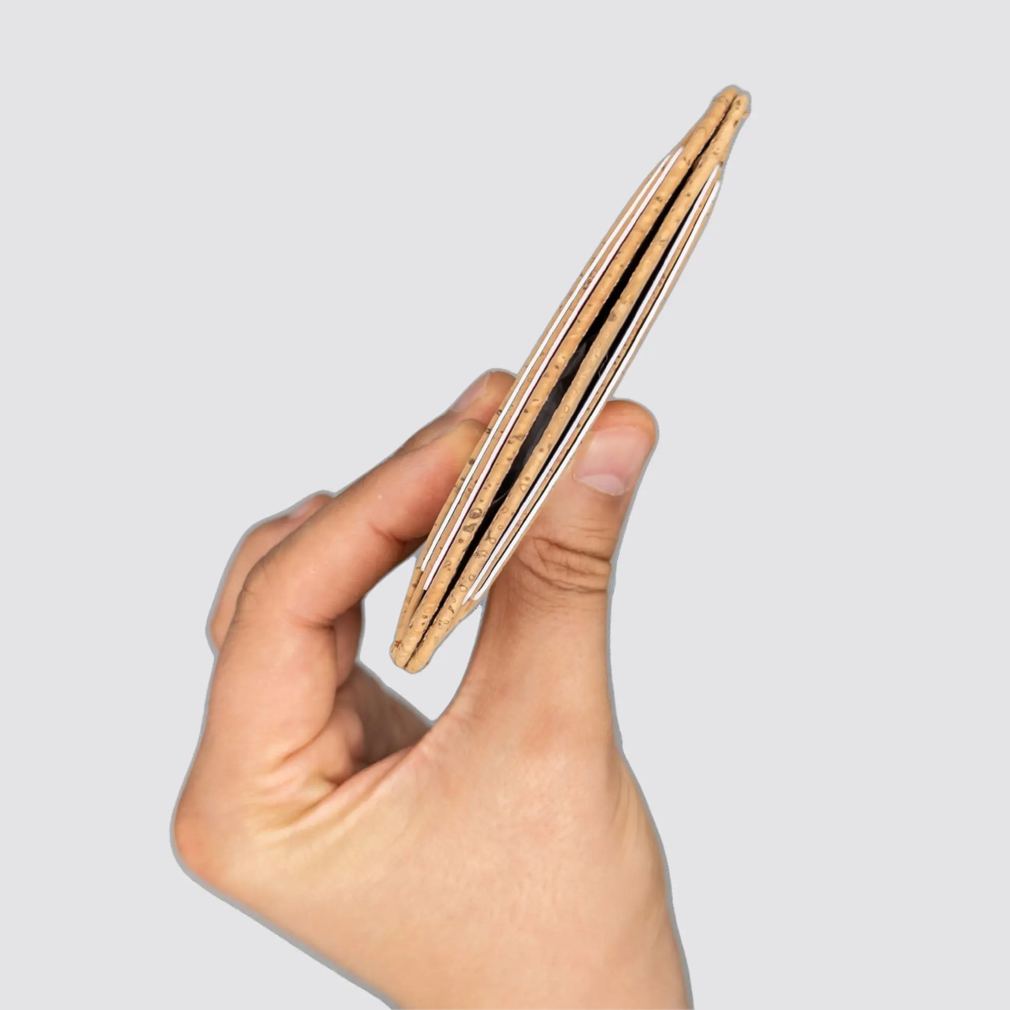 Compact natural cork wallet designed with RFID blocking for secure carry.