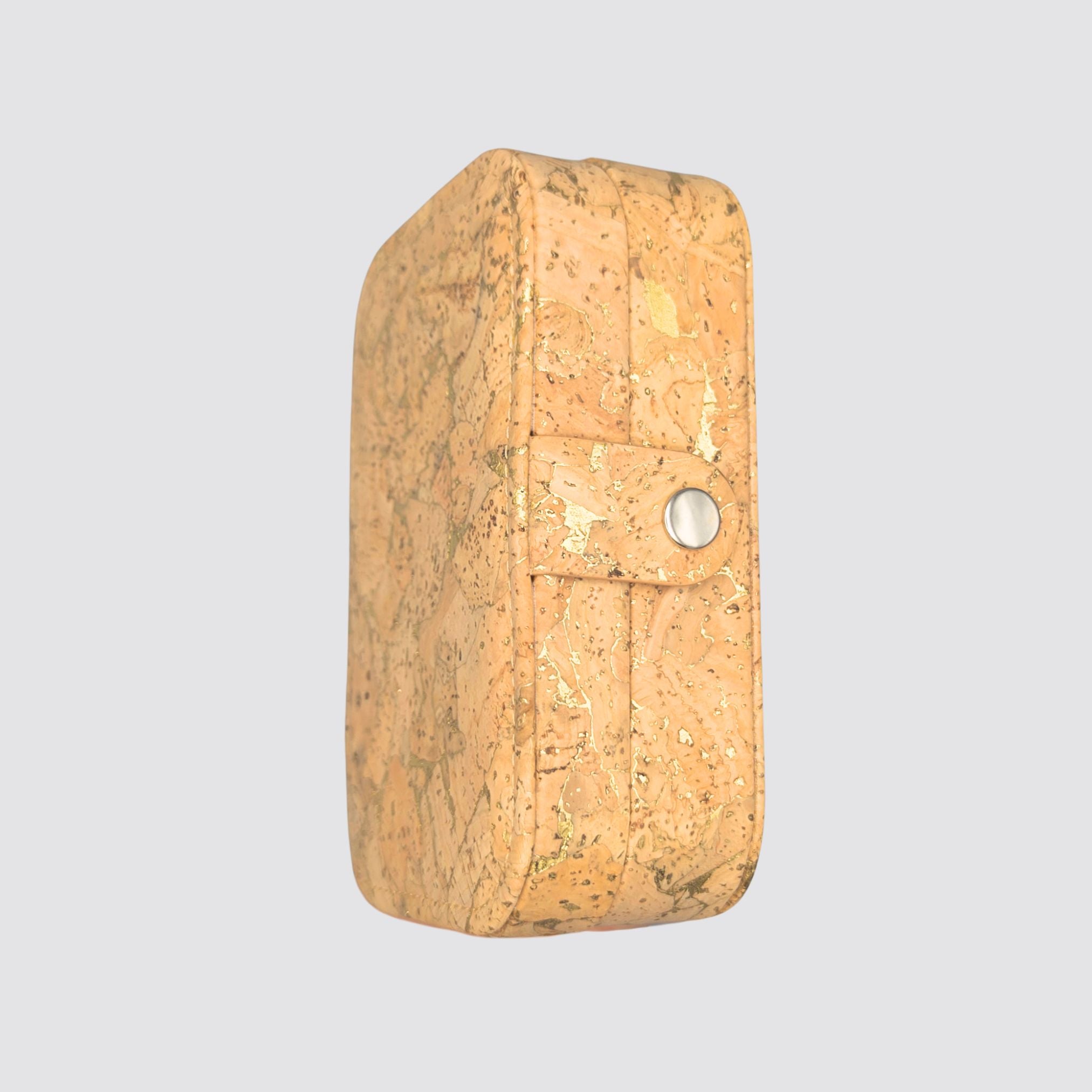 Eco-conscious golden cork jewellery storage box with sophisticated style and functionality.