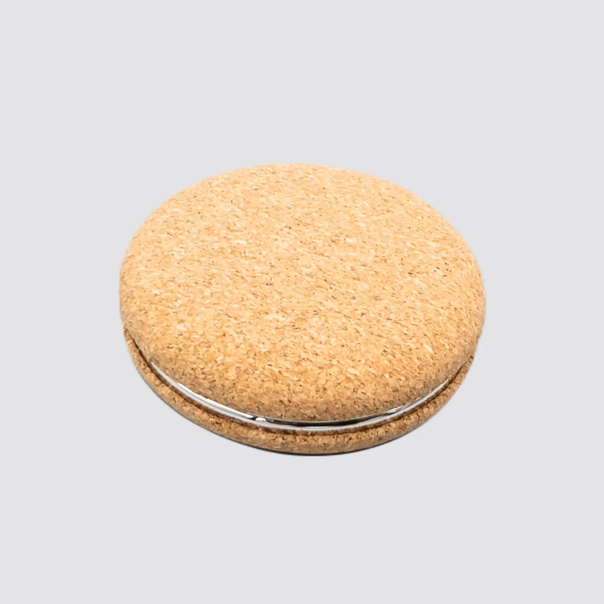 Eco-friendly cork compact mirror with 1X and 2X magnification options.