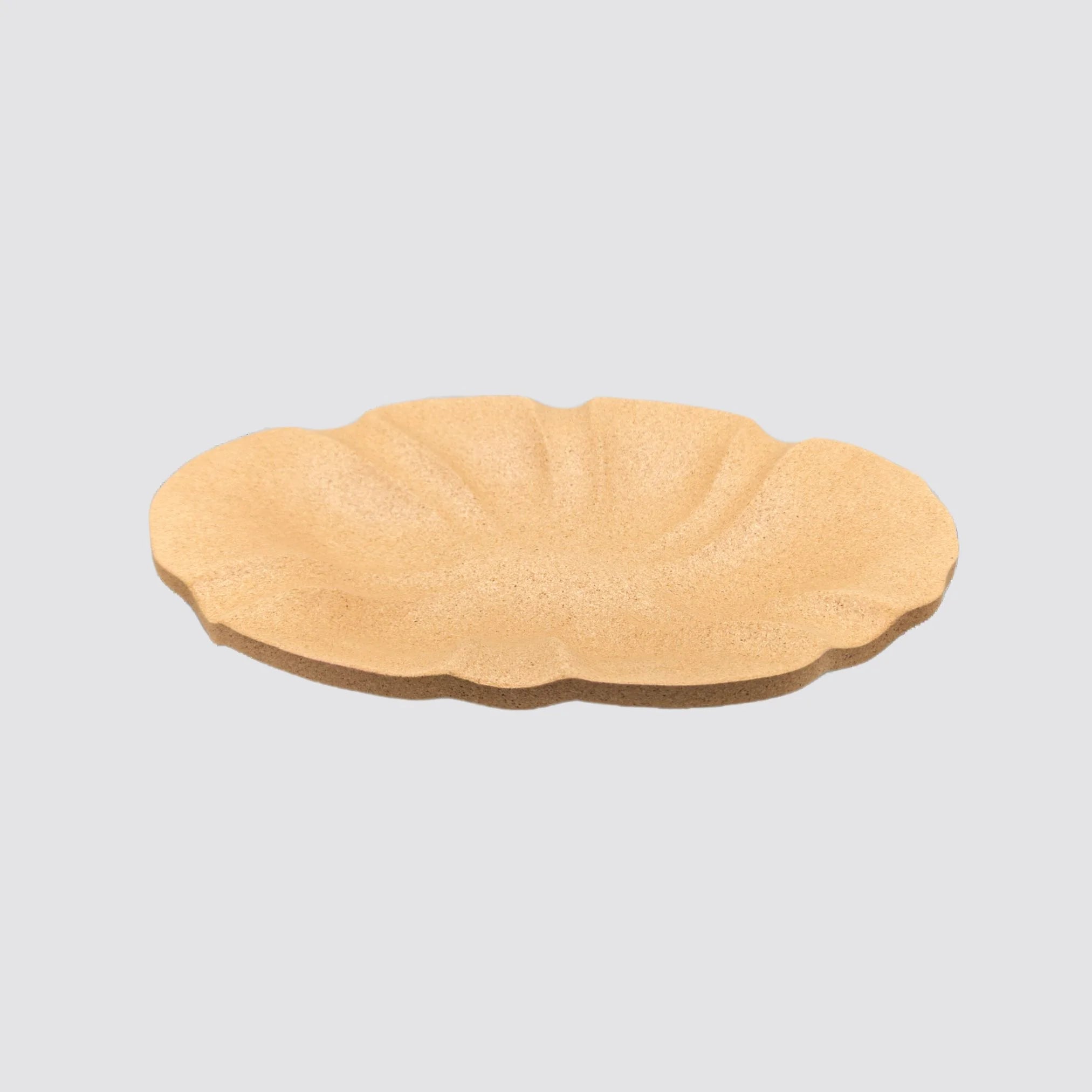 Eco-friendly cork fruit bowl featuring a modern and sustainable design.