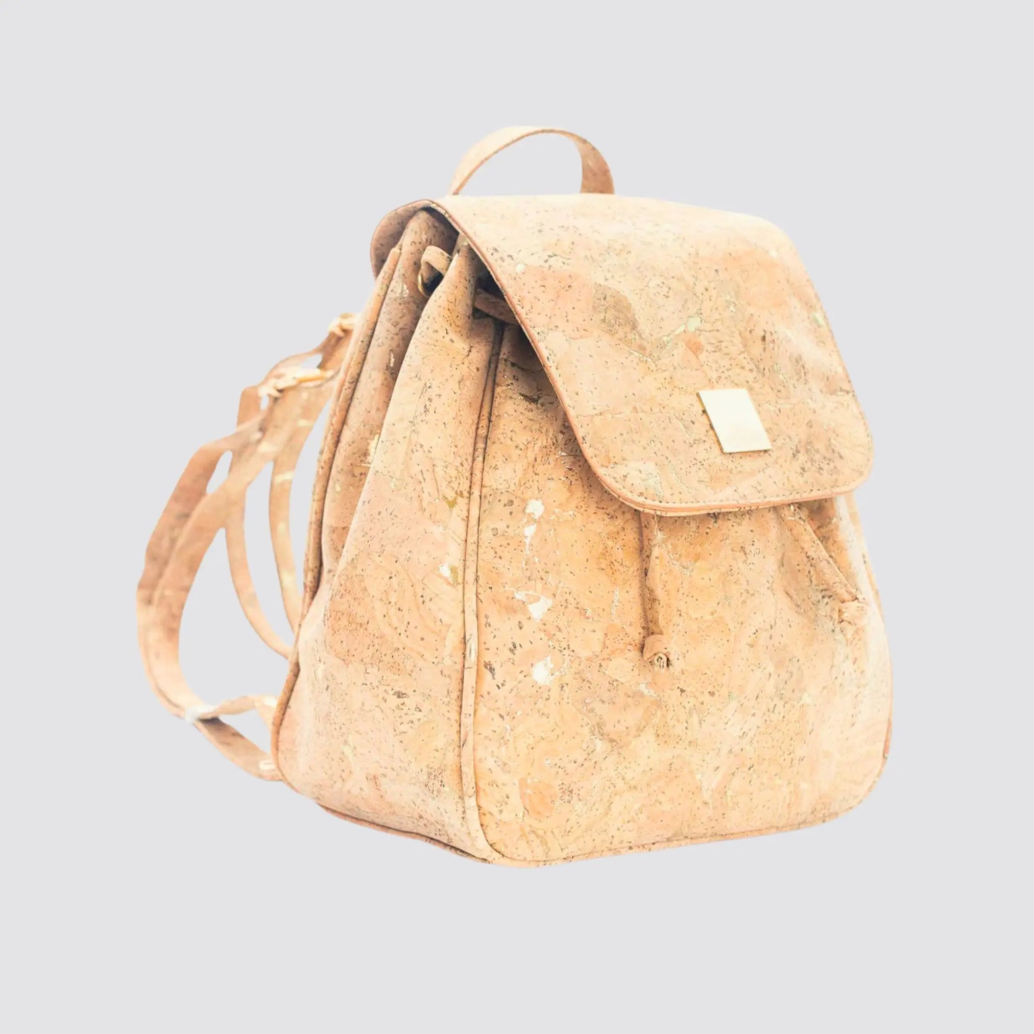 Eco-friendly golden cork drawstring backpack with vegan leather design.