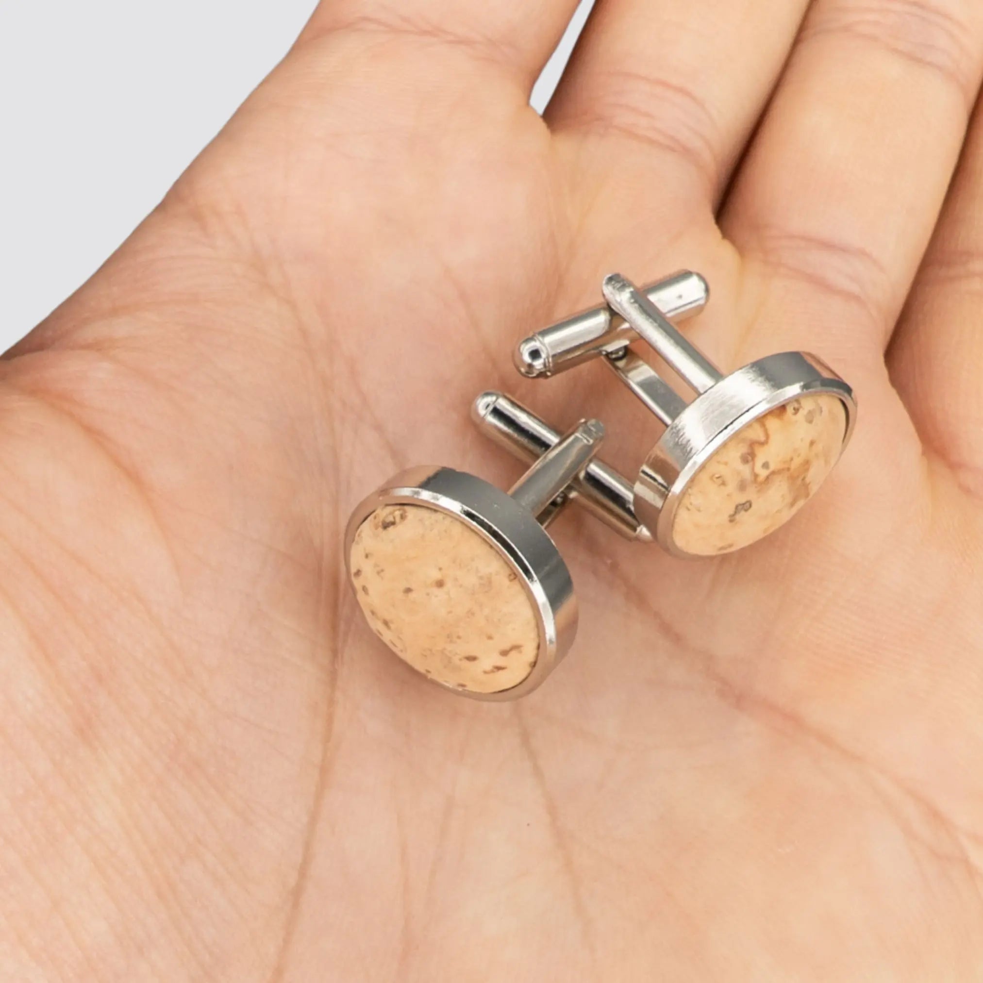 Eco-friendly natural cork cufflinks with polished cooper base.