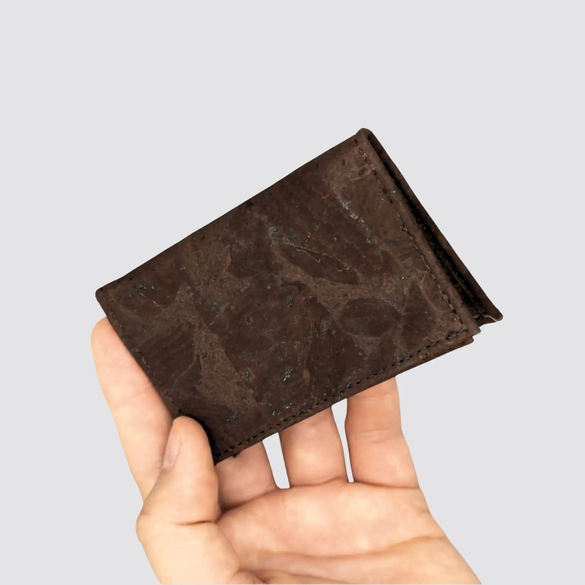 Back view of the eco-friendly RFID-blocking cork cardholder, highlighting sleek and compact style.
