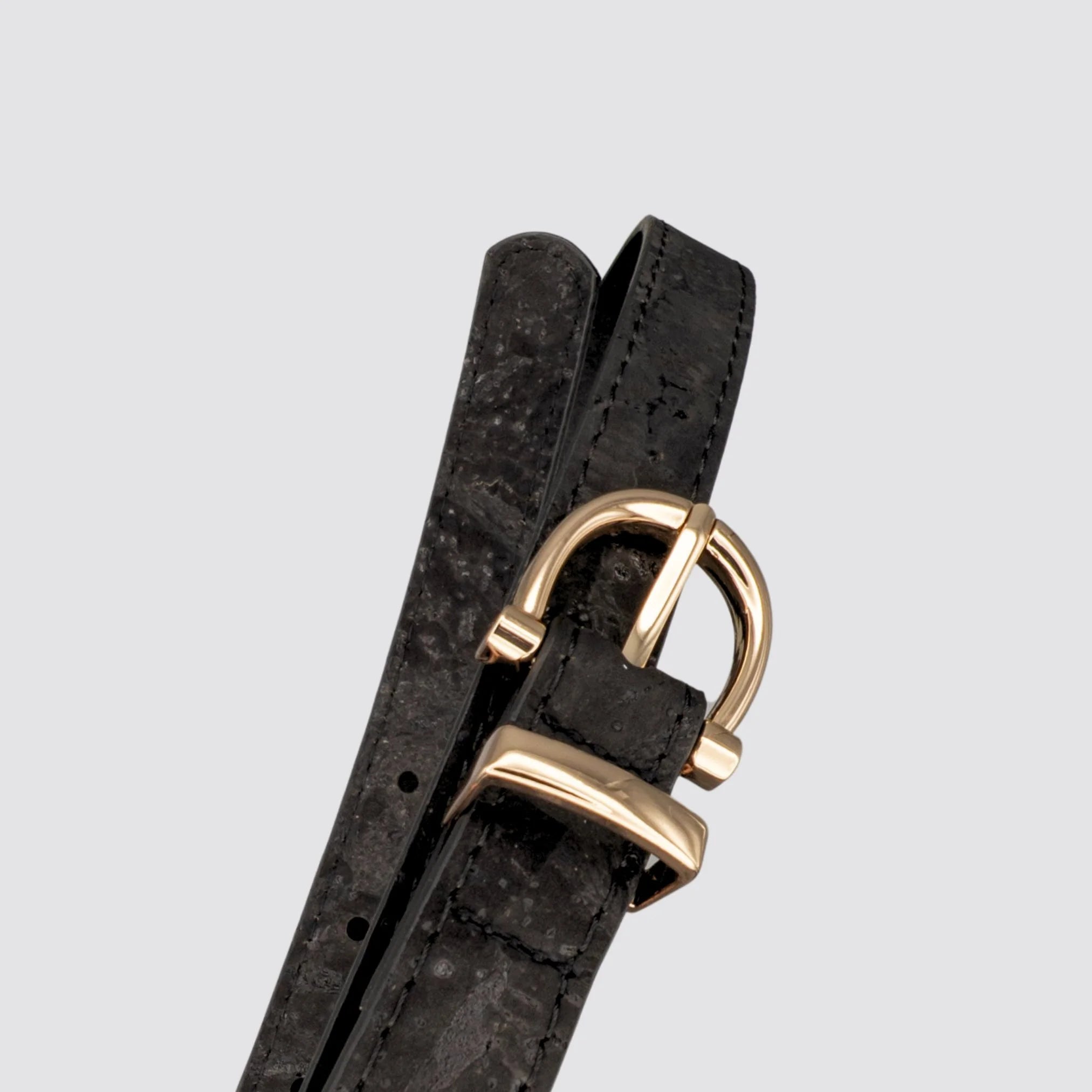 Eco-friendly vegan cork leather belt with an elegant gold buckle.