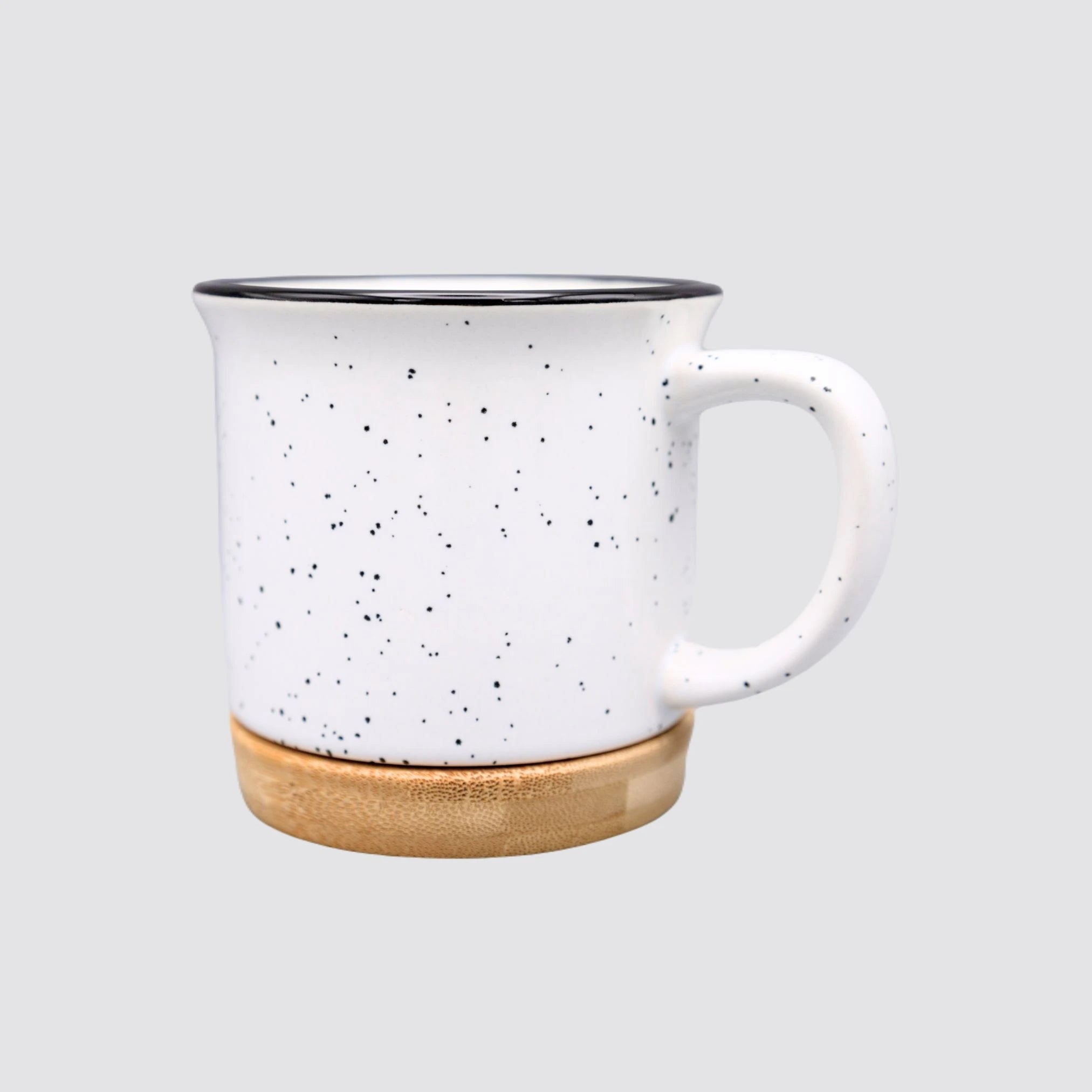 Elegant ceramic mug with a natural bamboo base for hot drinks.