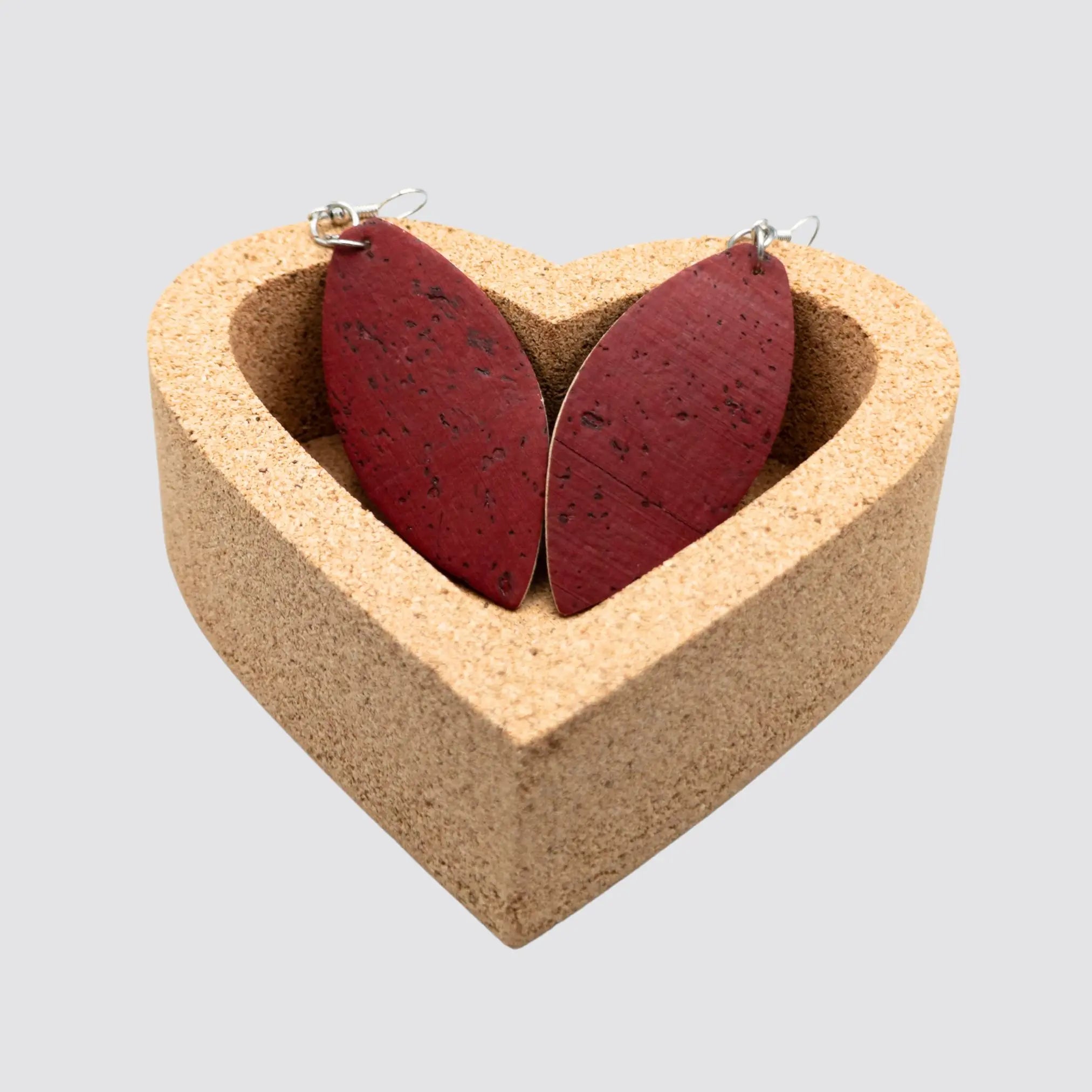 The elegant women earrings made of sustainable cork are displayed in a cork gift box.