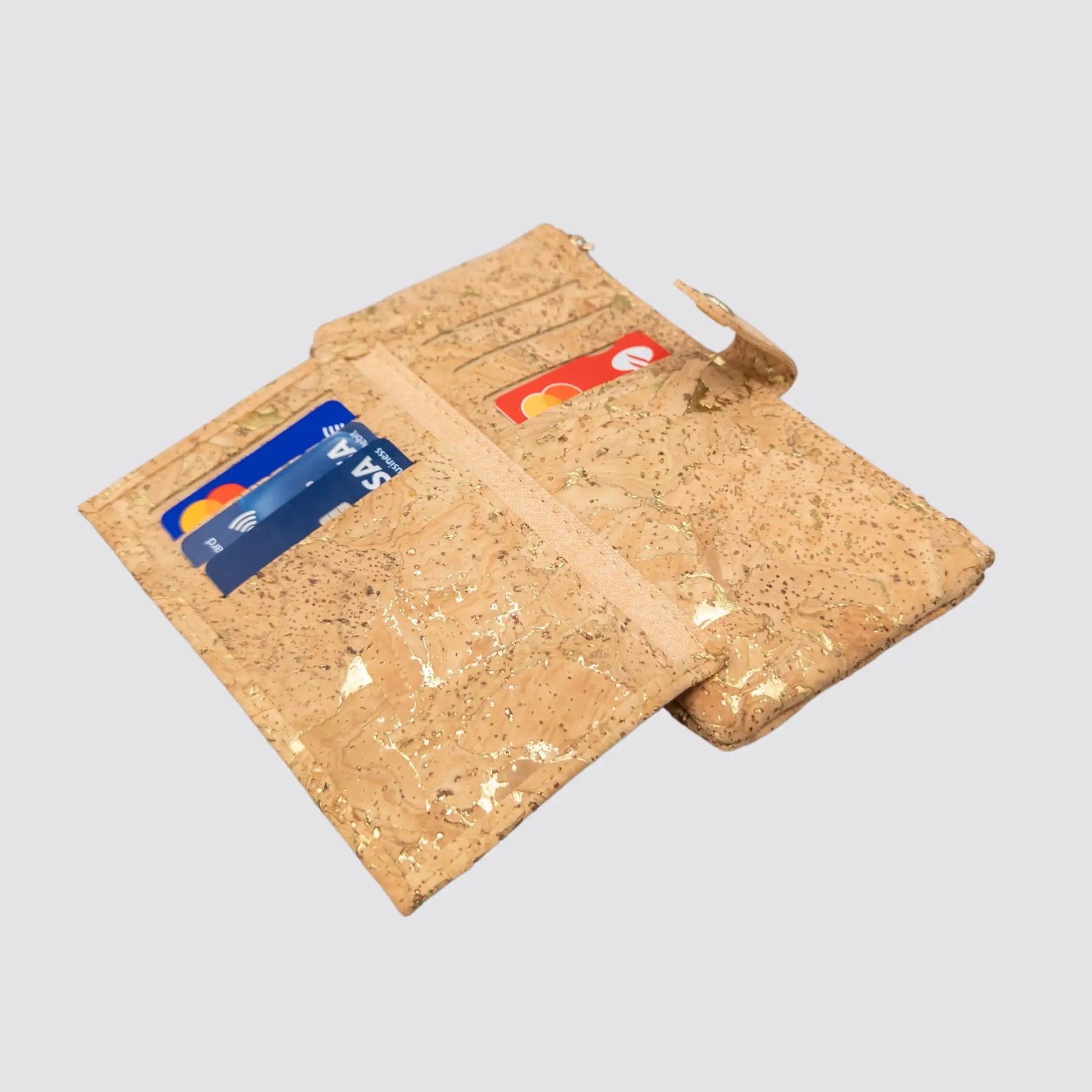 Open view of the elegant vegan leather gold cork wallet, displaying interior compartments.