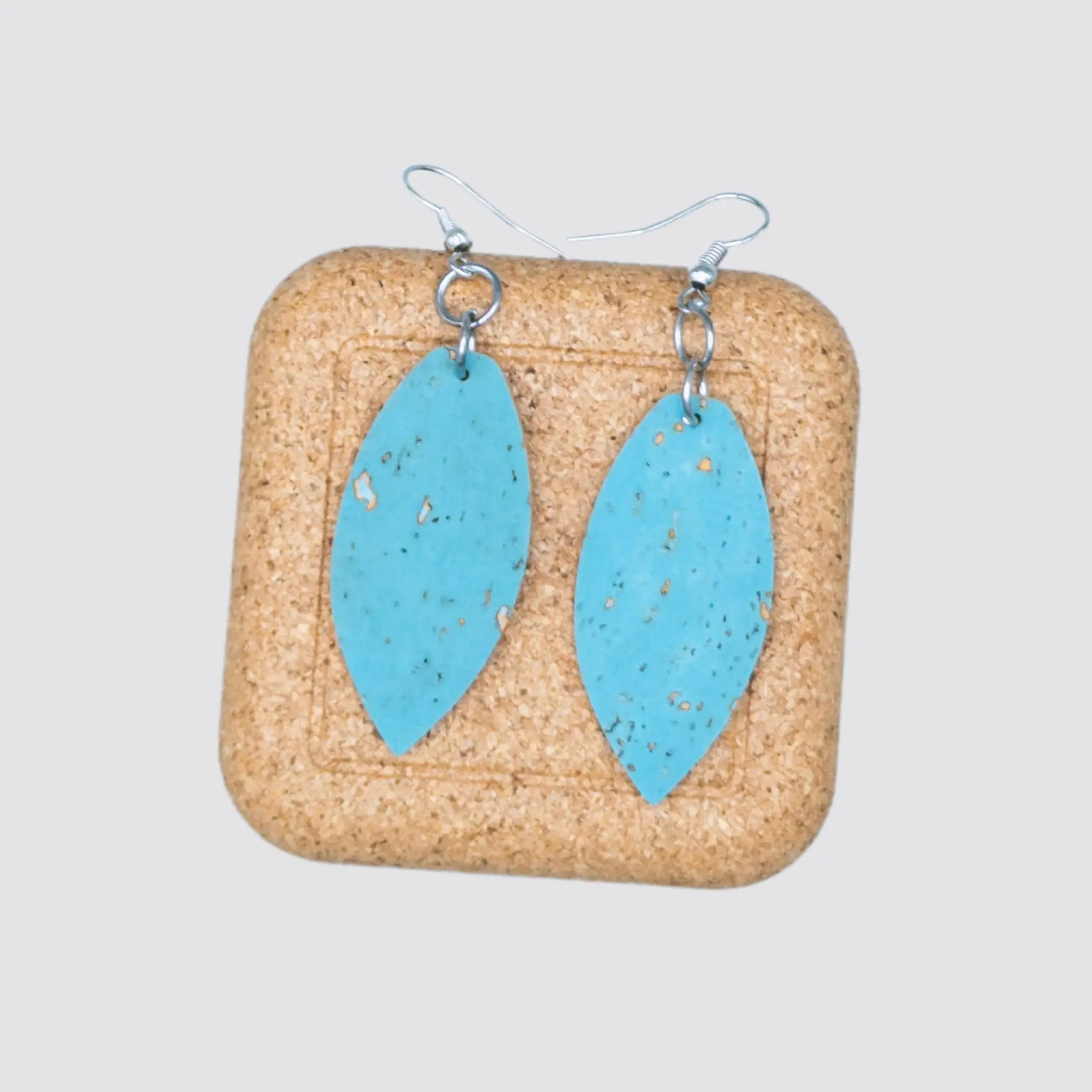 Handcrafted cork earrings with durable alloy components and a unique texture.