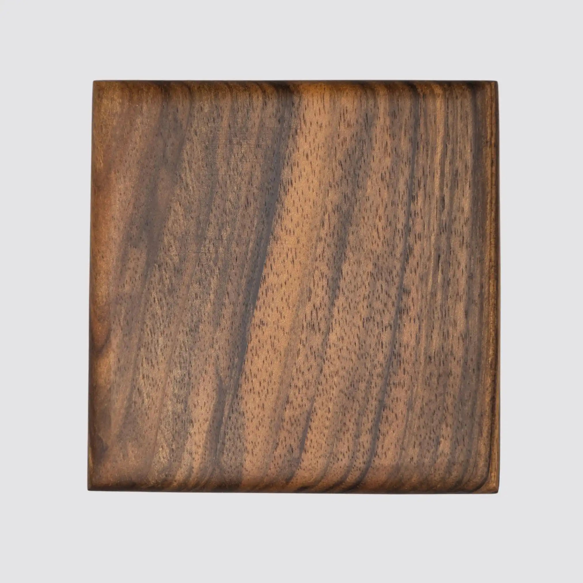 Front view of a handcrafted premium walnut coaster, highlighting the smooth finish.