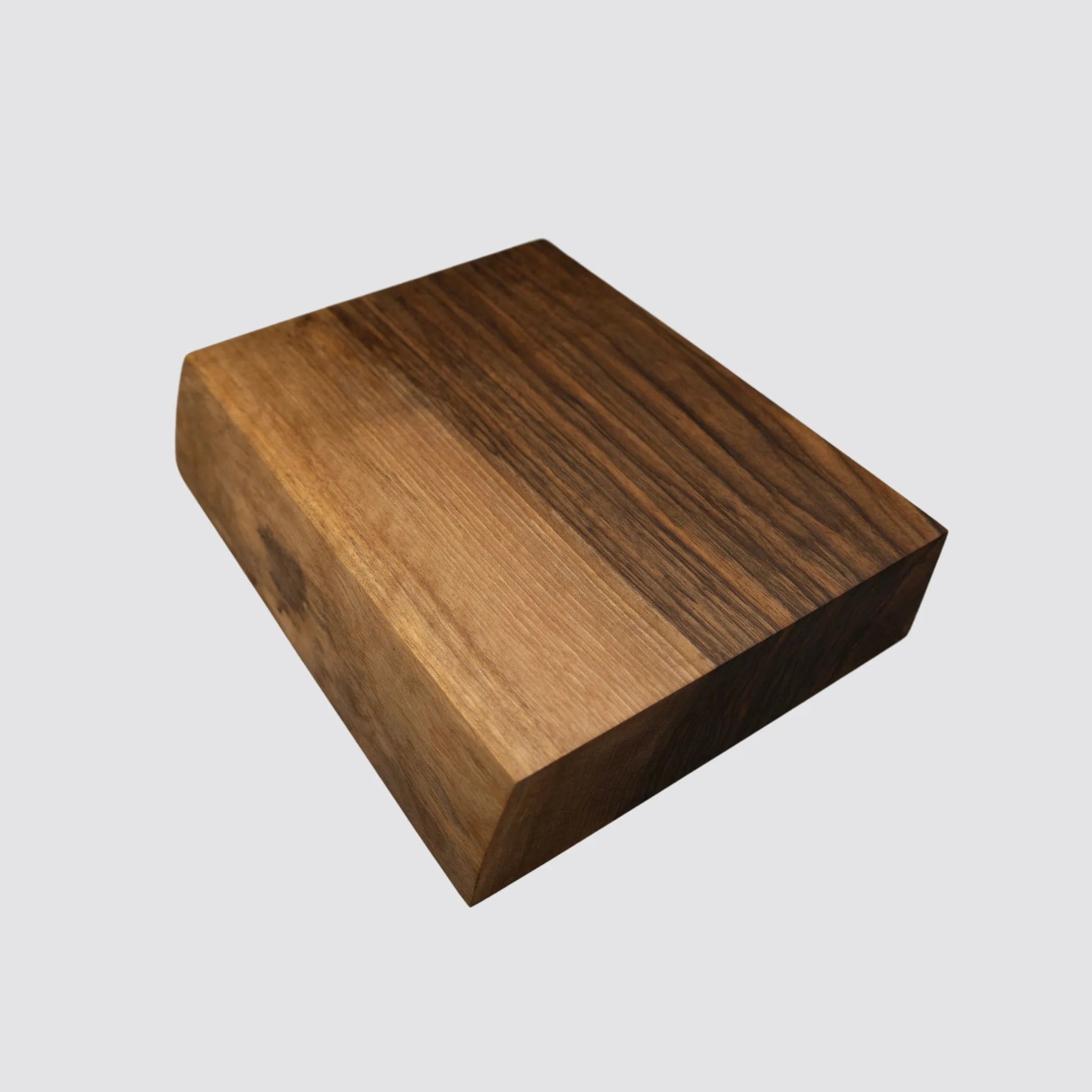 Heavy-duty walnut chopping block designed for slicing, dicing, and meal prep.