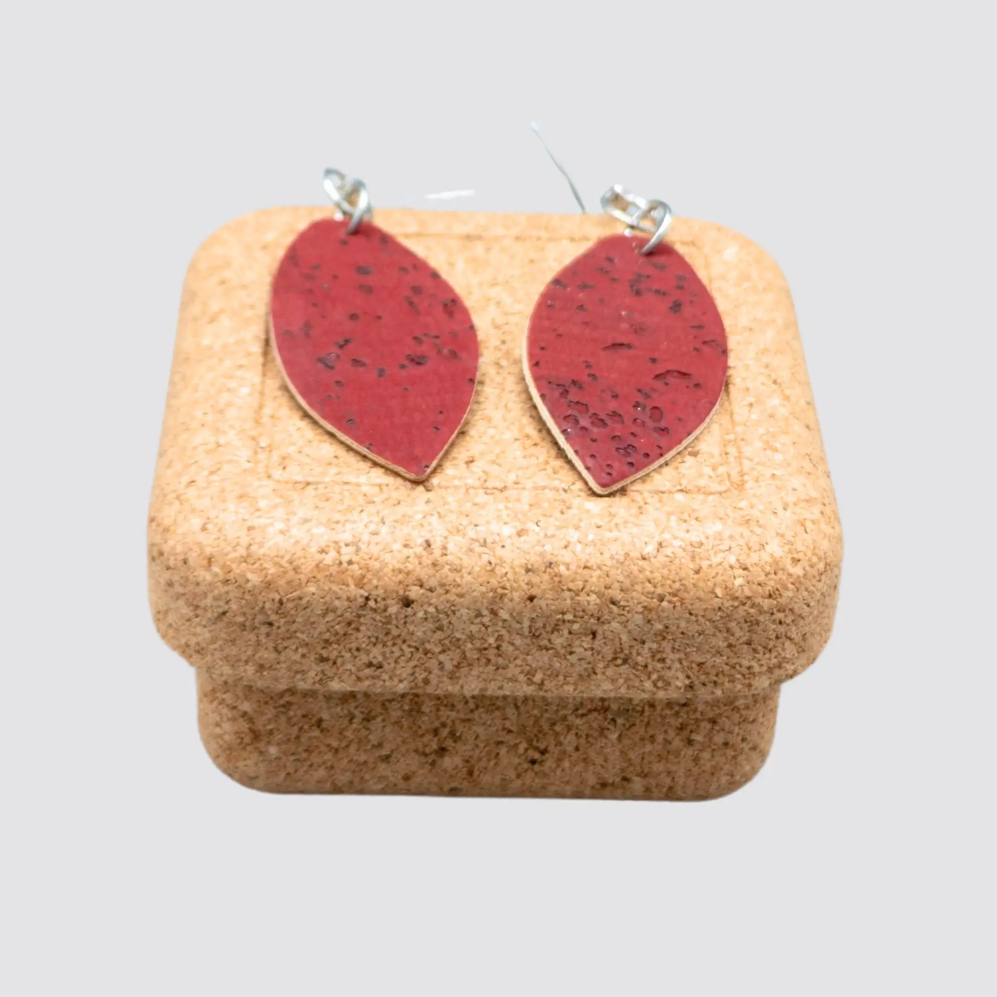 Lightweight eco-conscious cork earrings with gift-ready packaging.