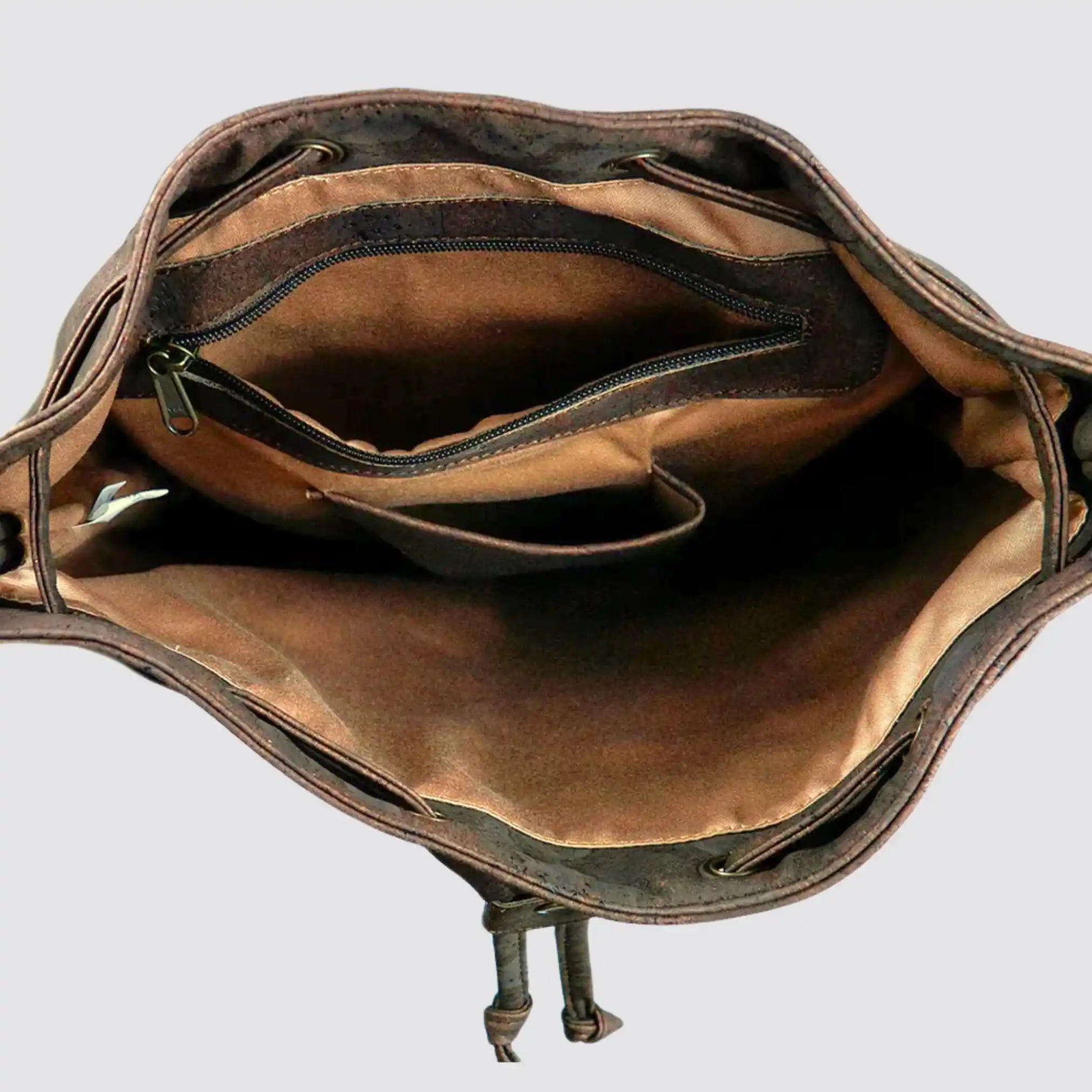 Lightweight vegan leather and cork backpack for daily commutes and travel.