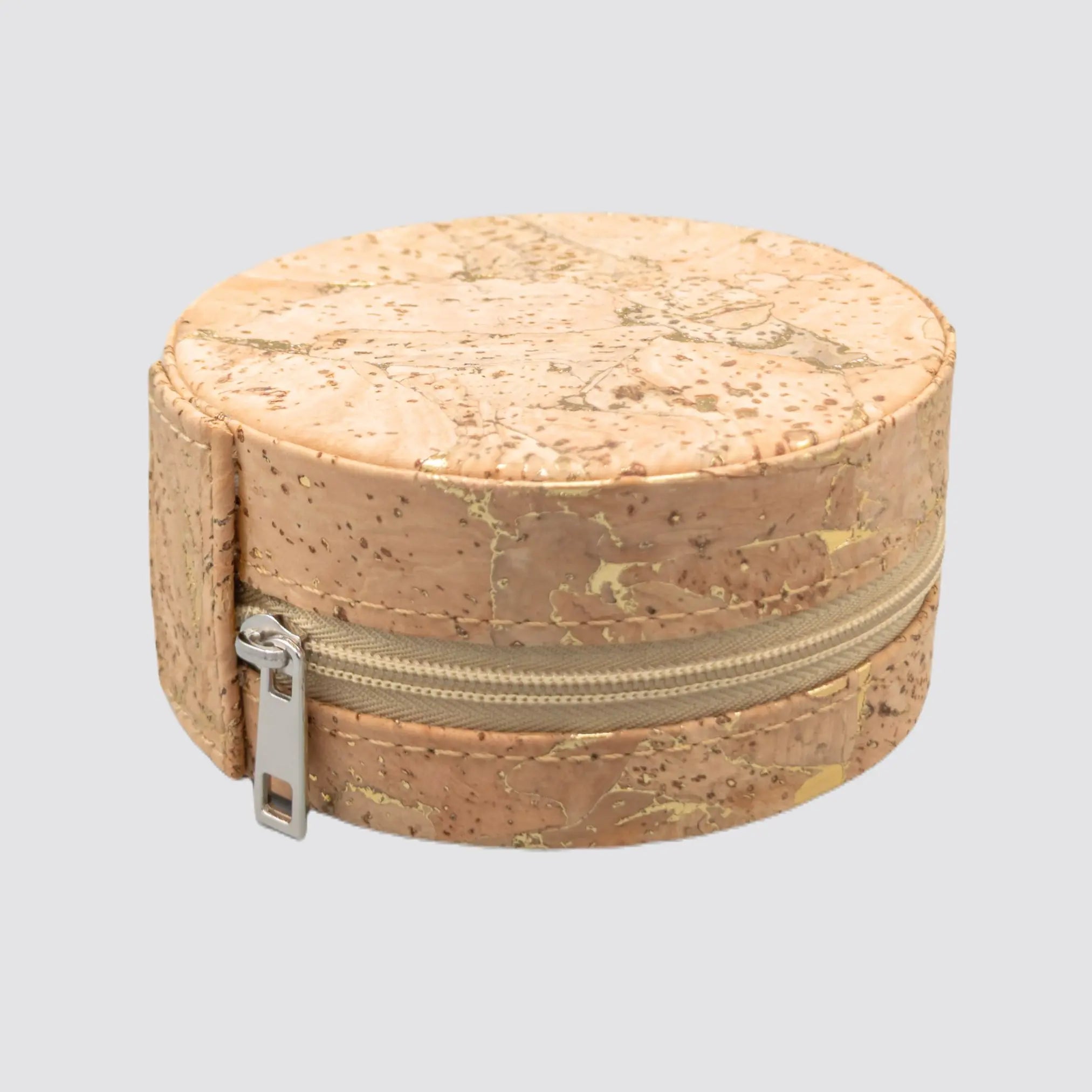 Luxurious cork jewellery storage box with refined gold accents.