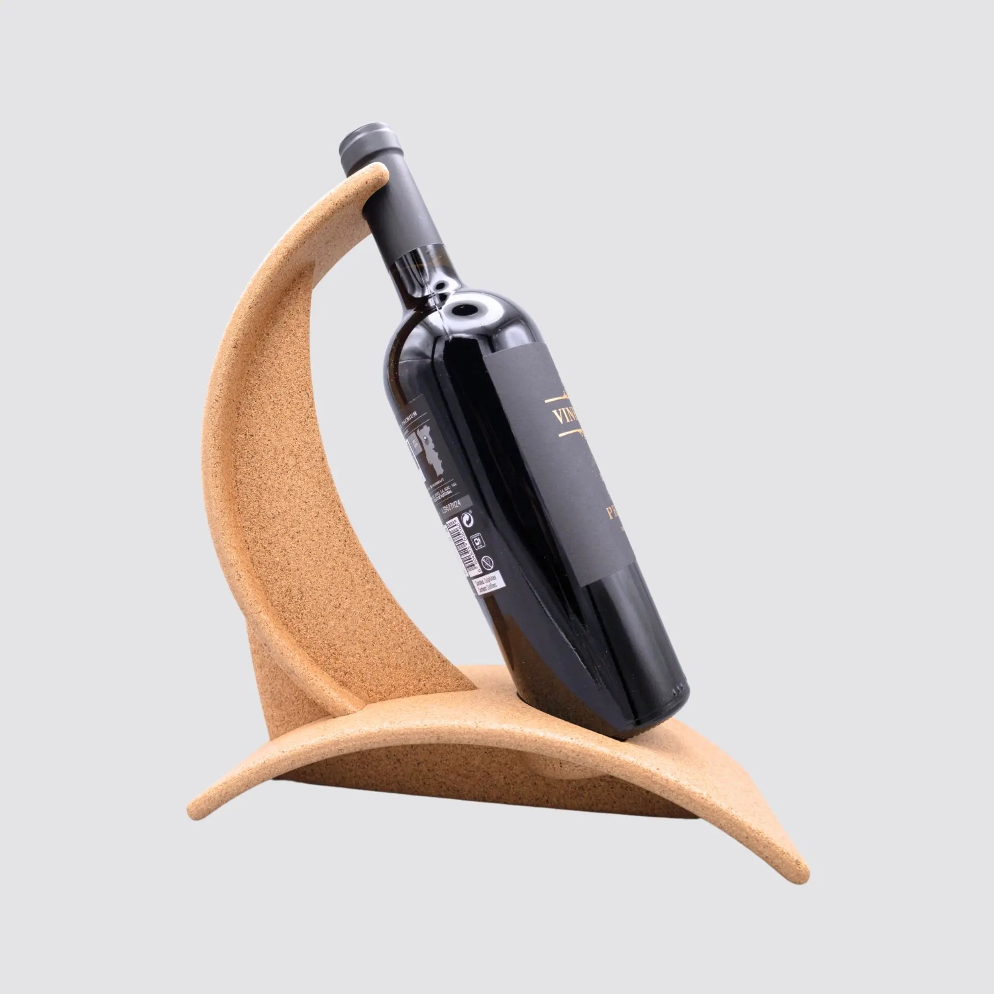 Luxury cork wine bottle holder featuring a wave-like modern design.
