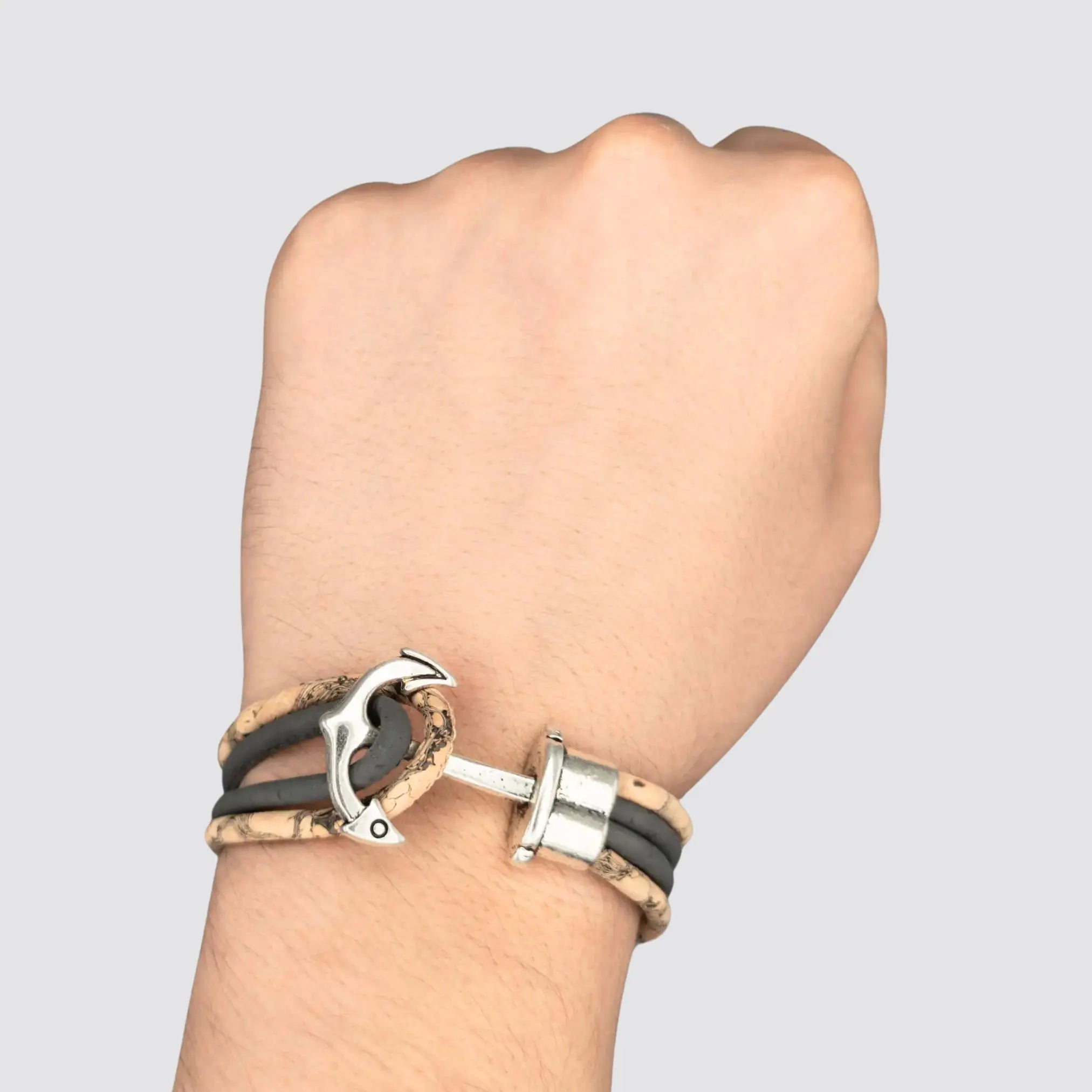 Minimalist cork bracelet worn on a wrist, illustrating its unisex appeal.