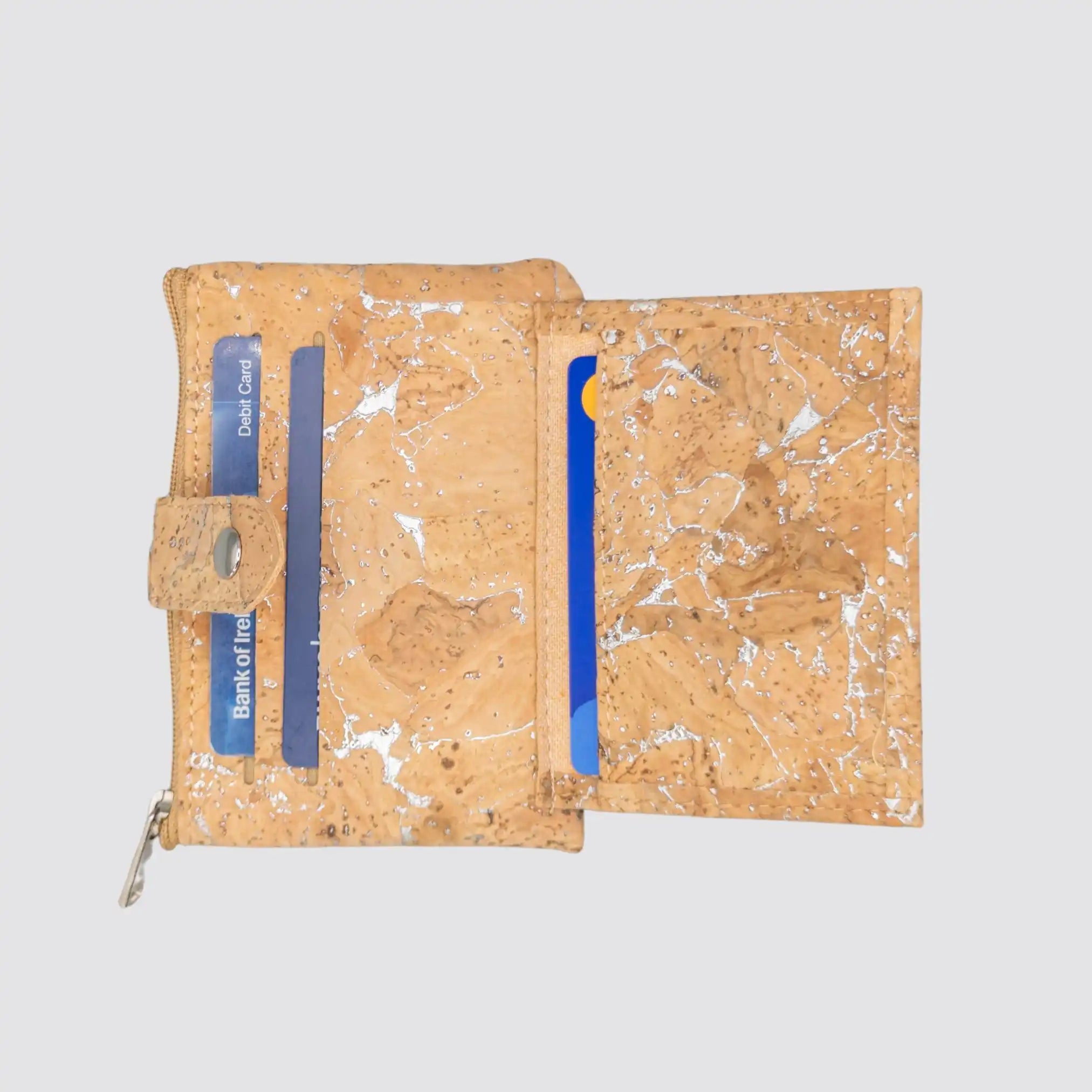 Modern women’s silver cork wallet with sustainable materials and practical features.