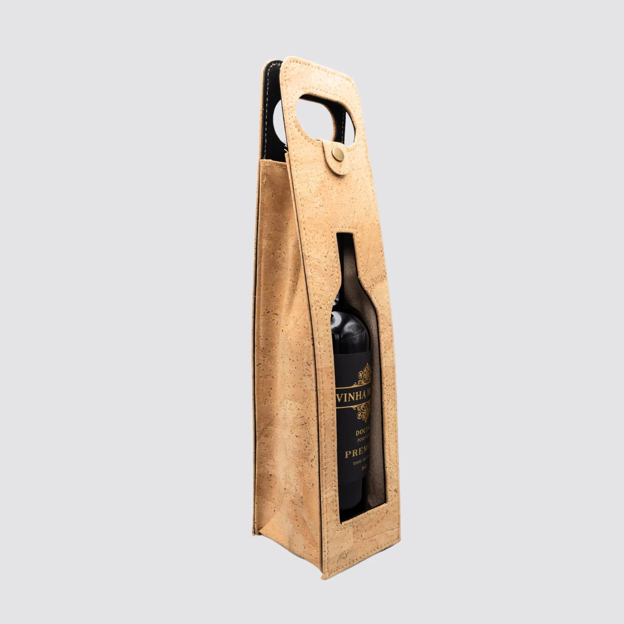 Natural cork wine carrier with a cut-out window for label display.