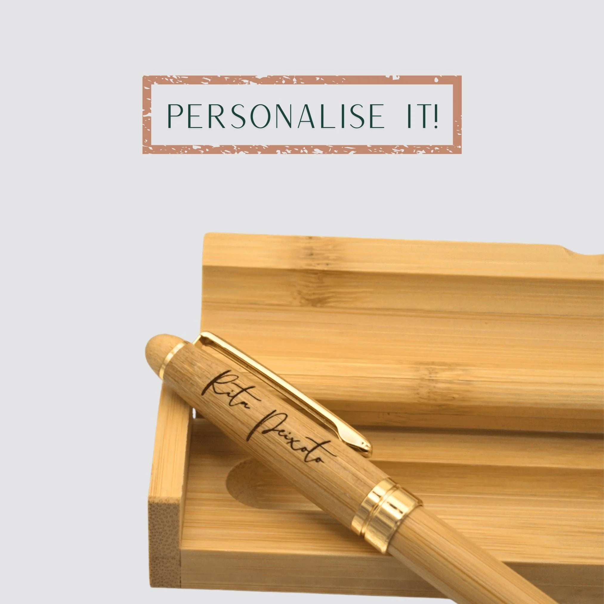 The luxurious bamboo ballpoint pen is personalised with a name, making for a distinguished gift.