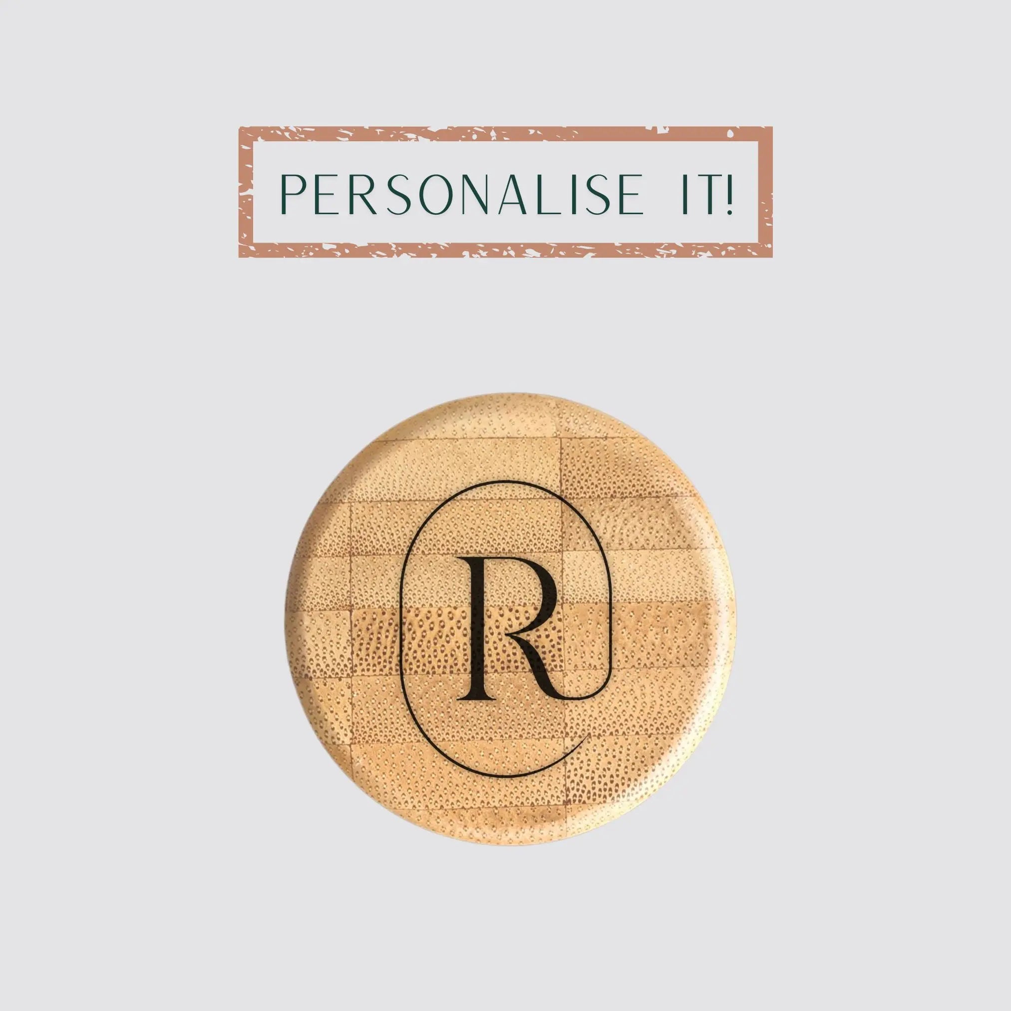 The sustainable water bottle with a bamboo tap is personalised with laser engraving.