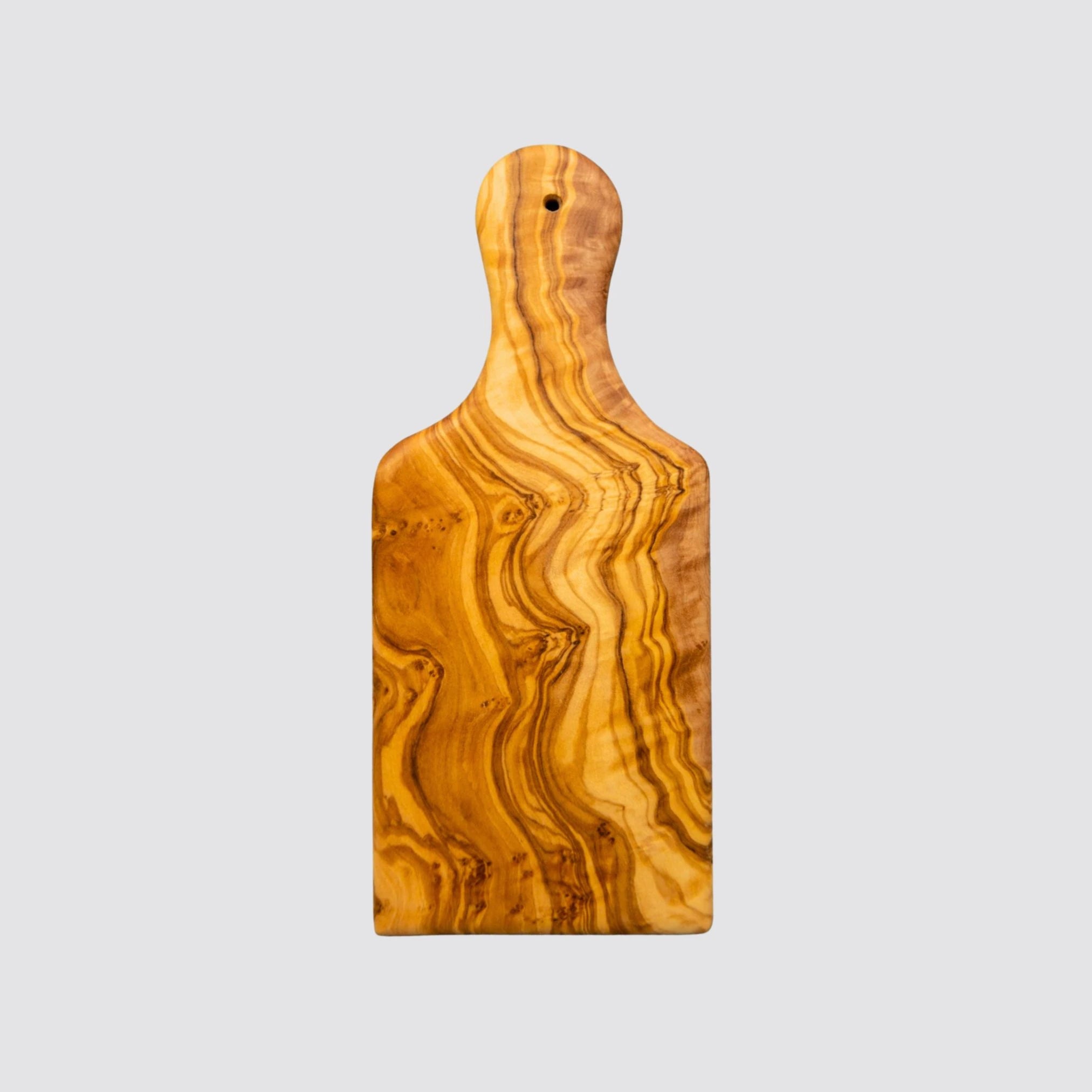 The petite serving board is made of sustainable olive wood and has a handle.