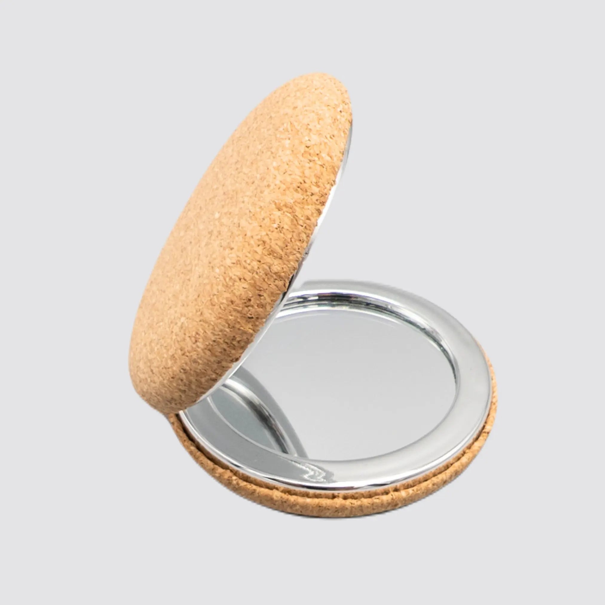Side profile of the portable cork makeup mirror, highlighting its compactness.