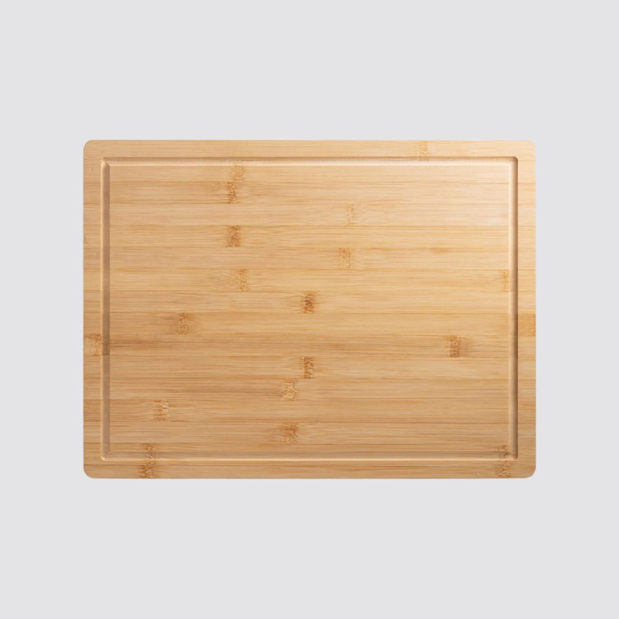 Premium bamboo cutting board displayed on a light gray background.