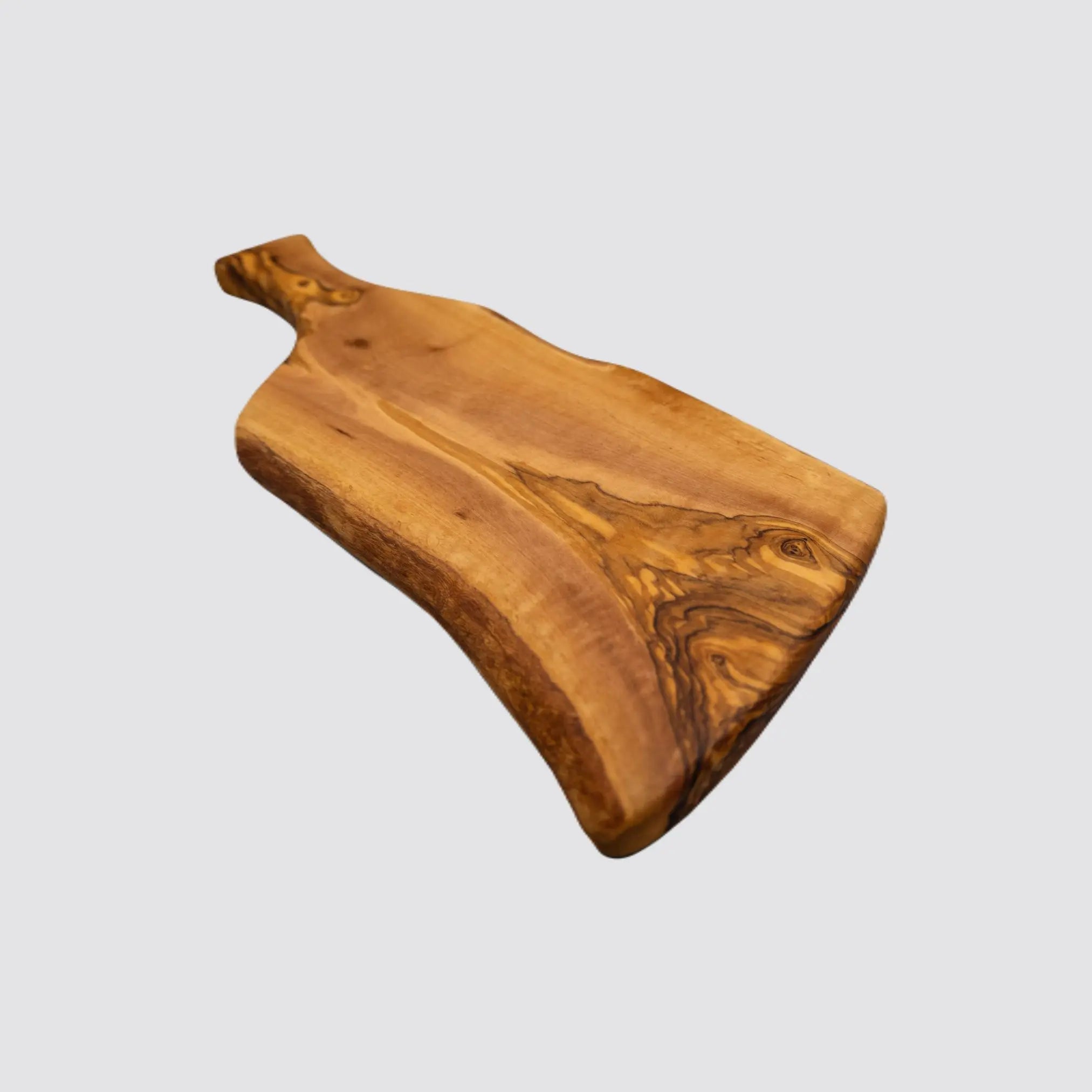 Rustic olive wood cheese board featuring unique grain patterns.
