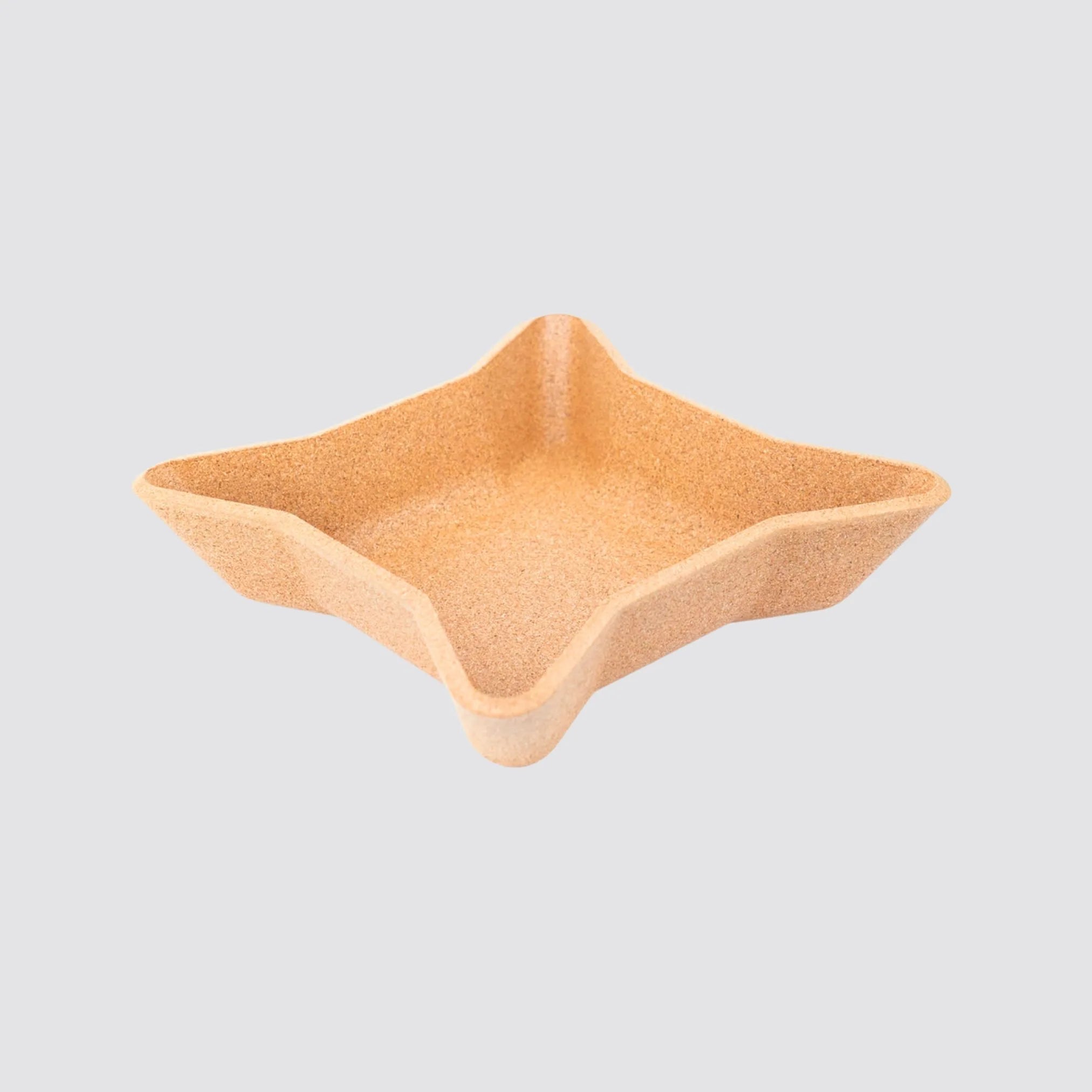 Scratch-resistant cork tray for protecting delicate accessories.