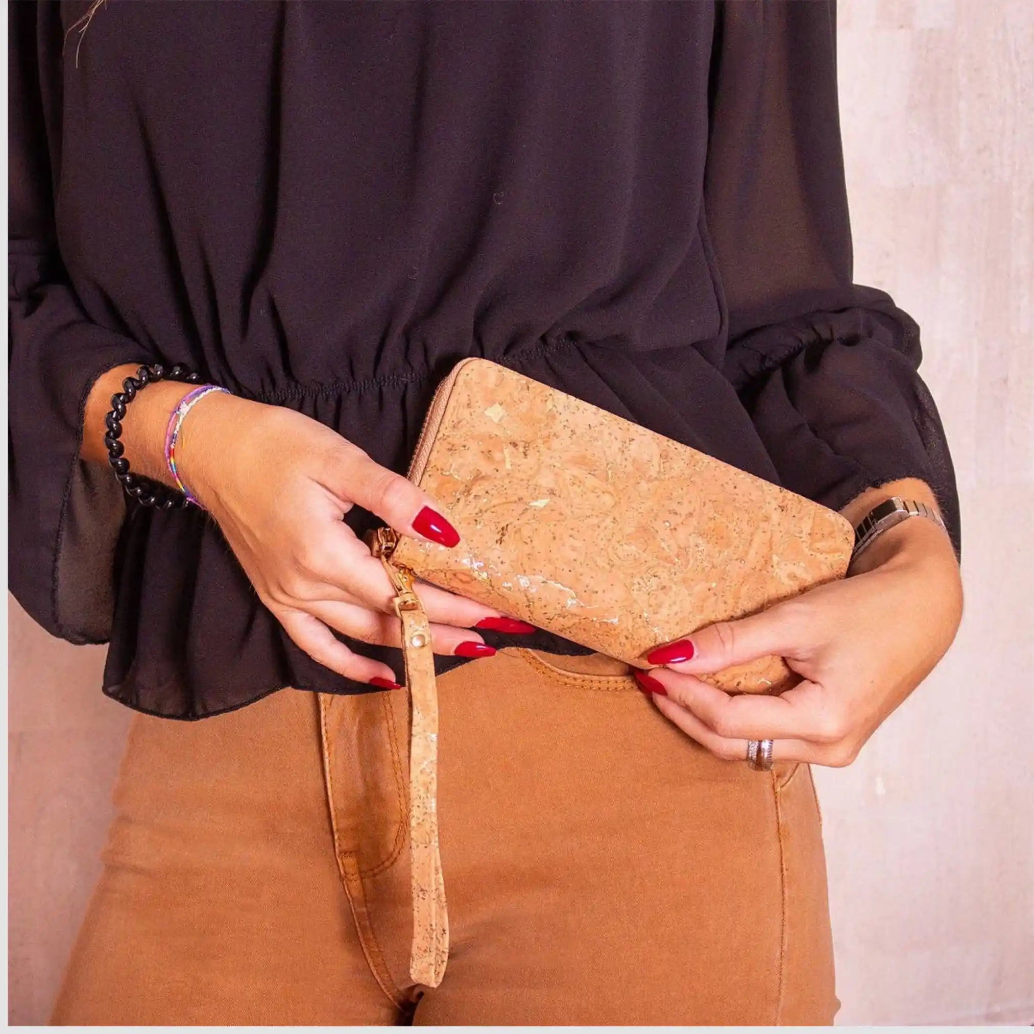 Shimmering gold cork wallet for eco-conscious daily use and glamorous nights out.