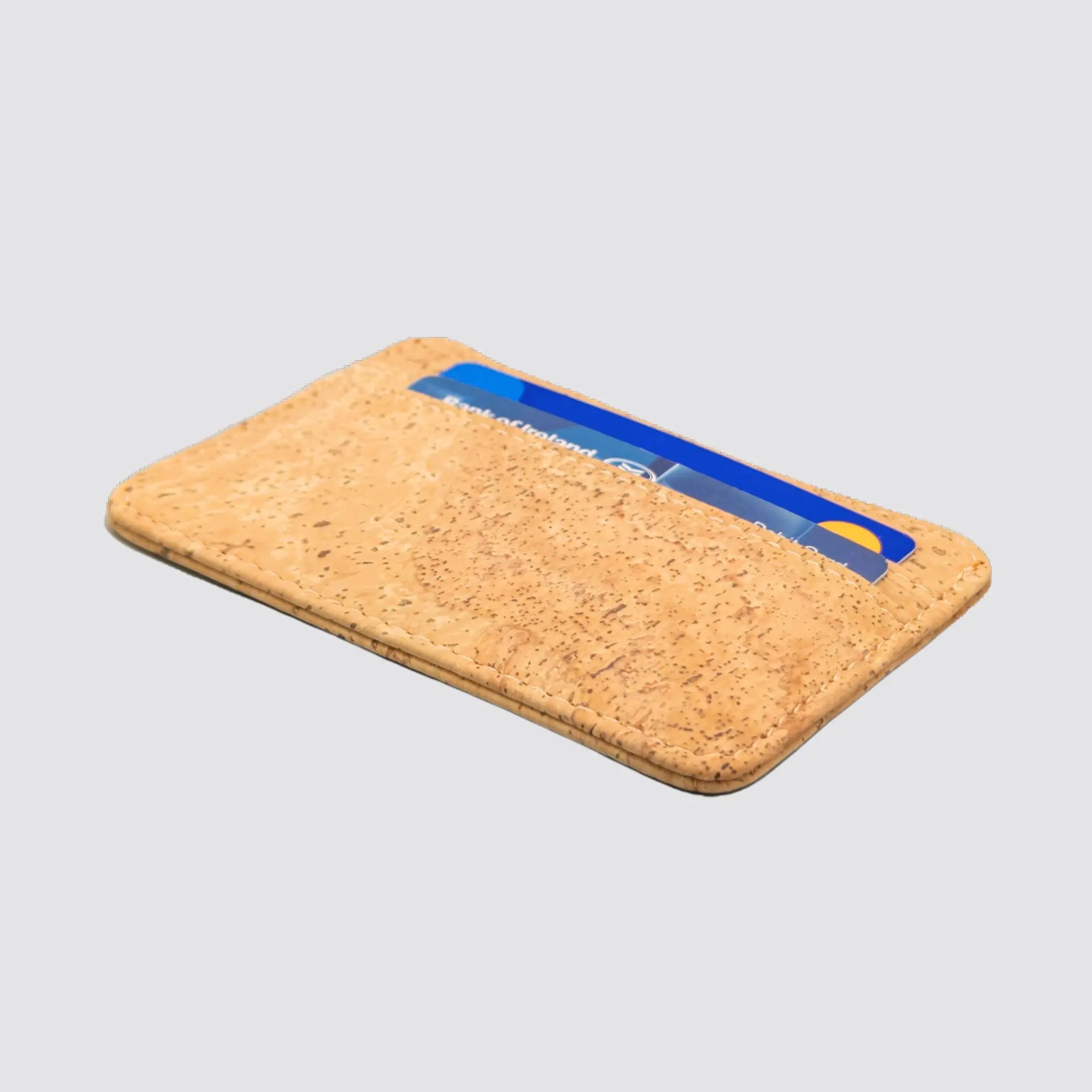 Sleek sustainable cork wallet with 4 card slots and a cash pocket.