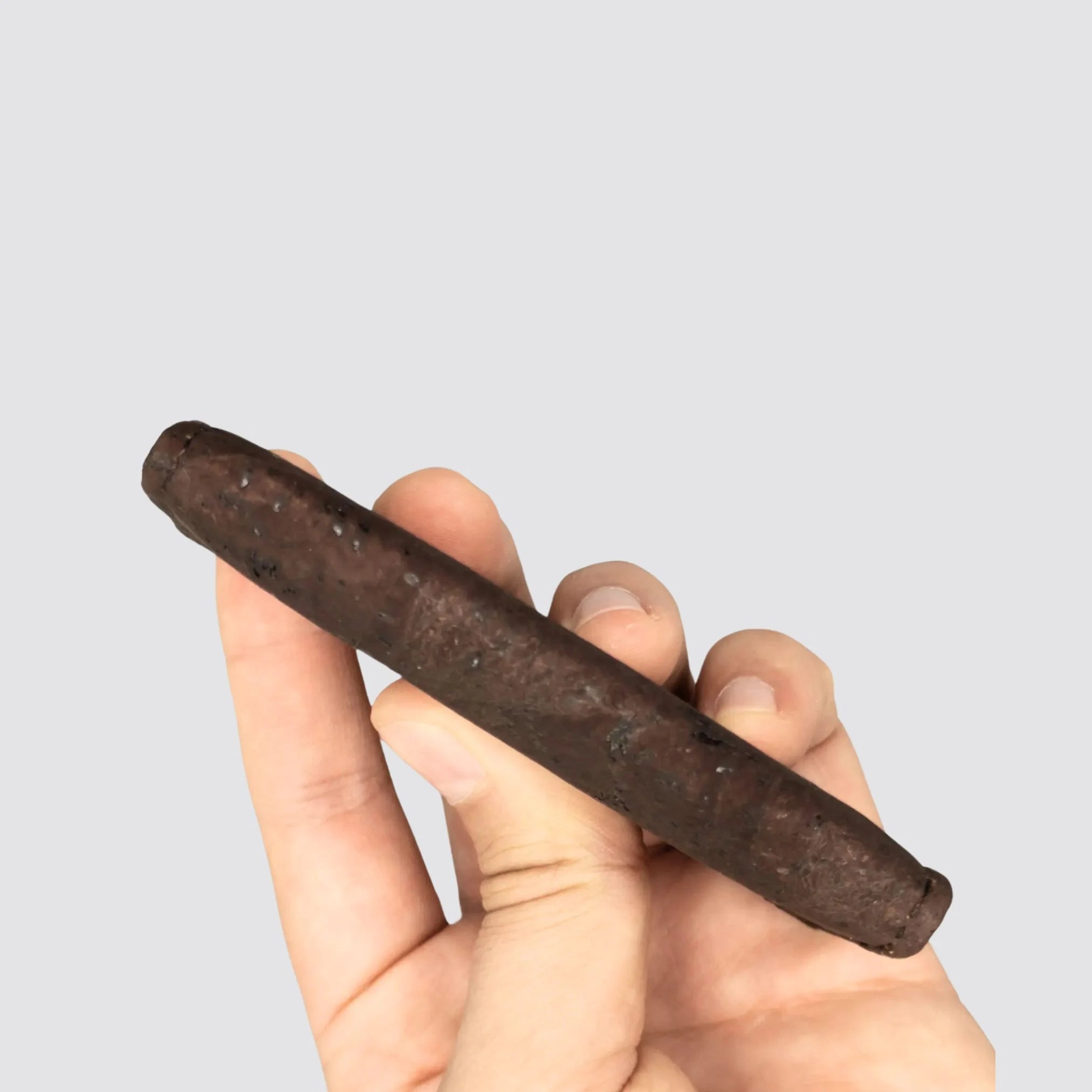 Side view of the slim RFID cork cardholder on a plain light gray background, perfect for modern minimalists.