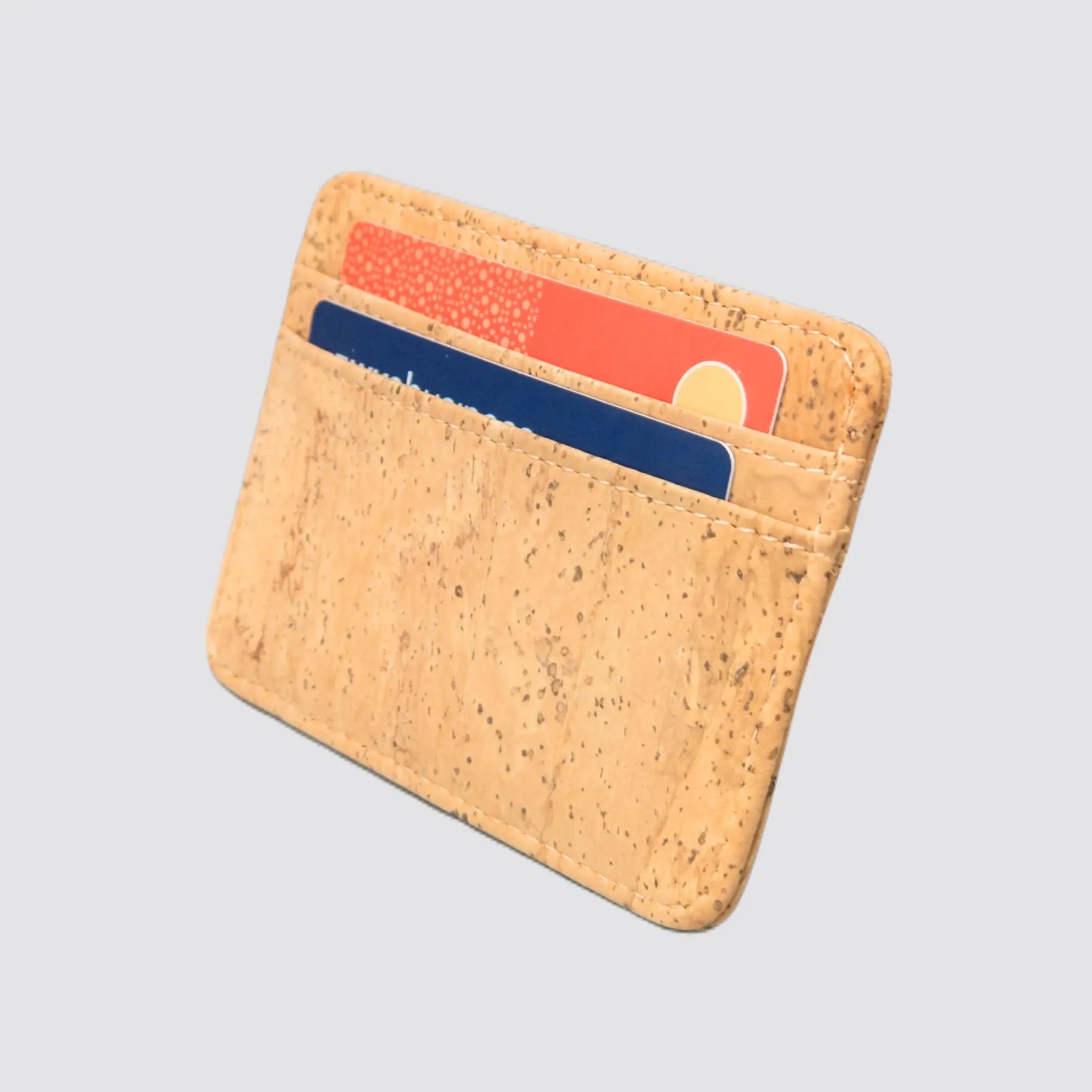 Slim cork RFID wallet with a minimalist design and eco-friendly material.