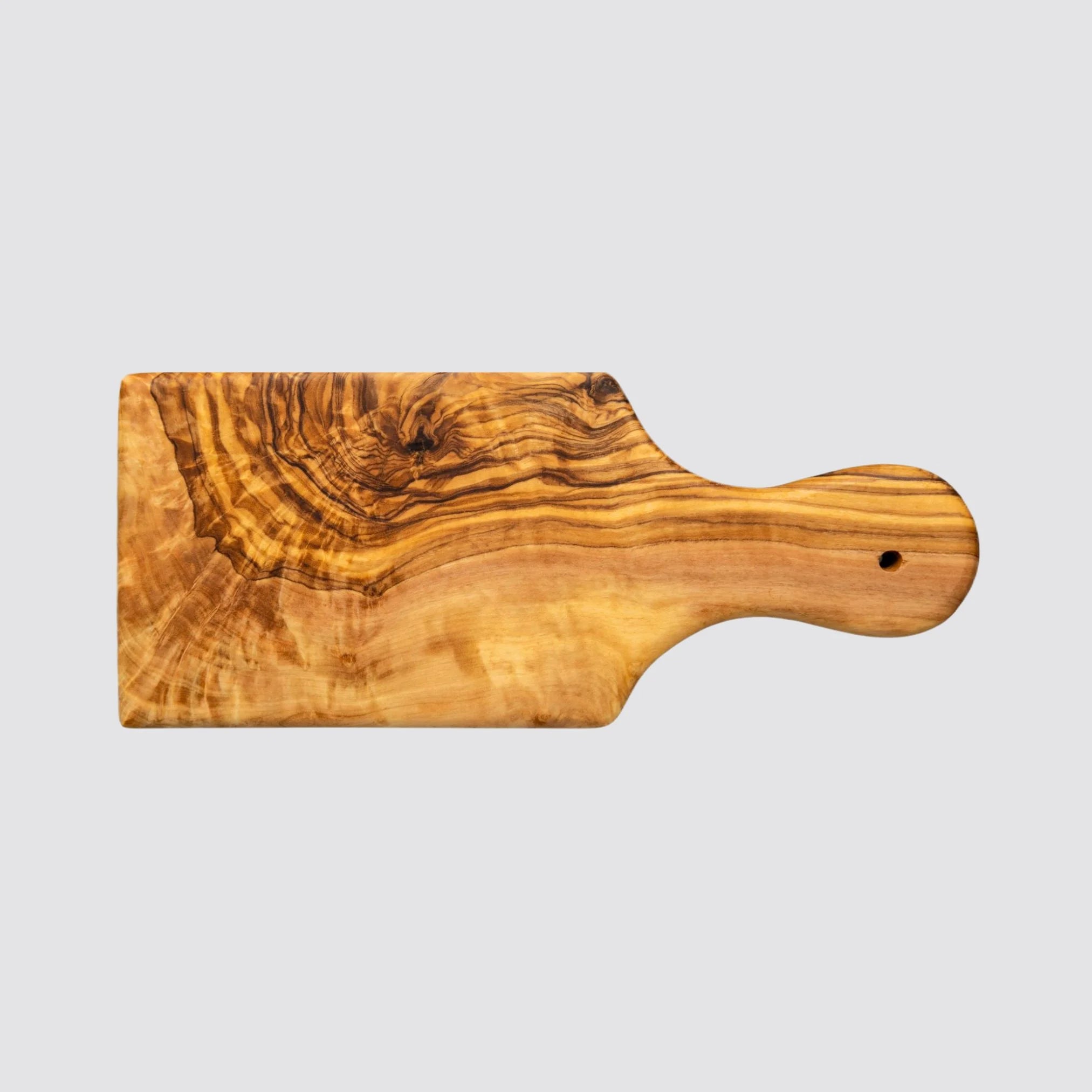 The small luxury serving board is made of premium olive wood and has a handle.