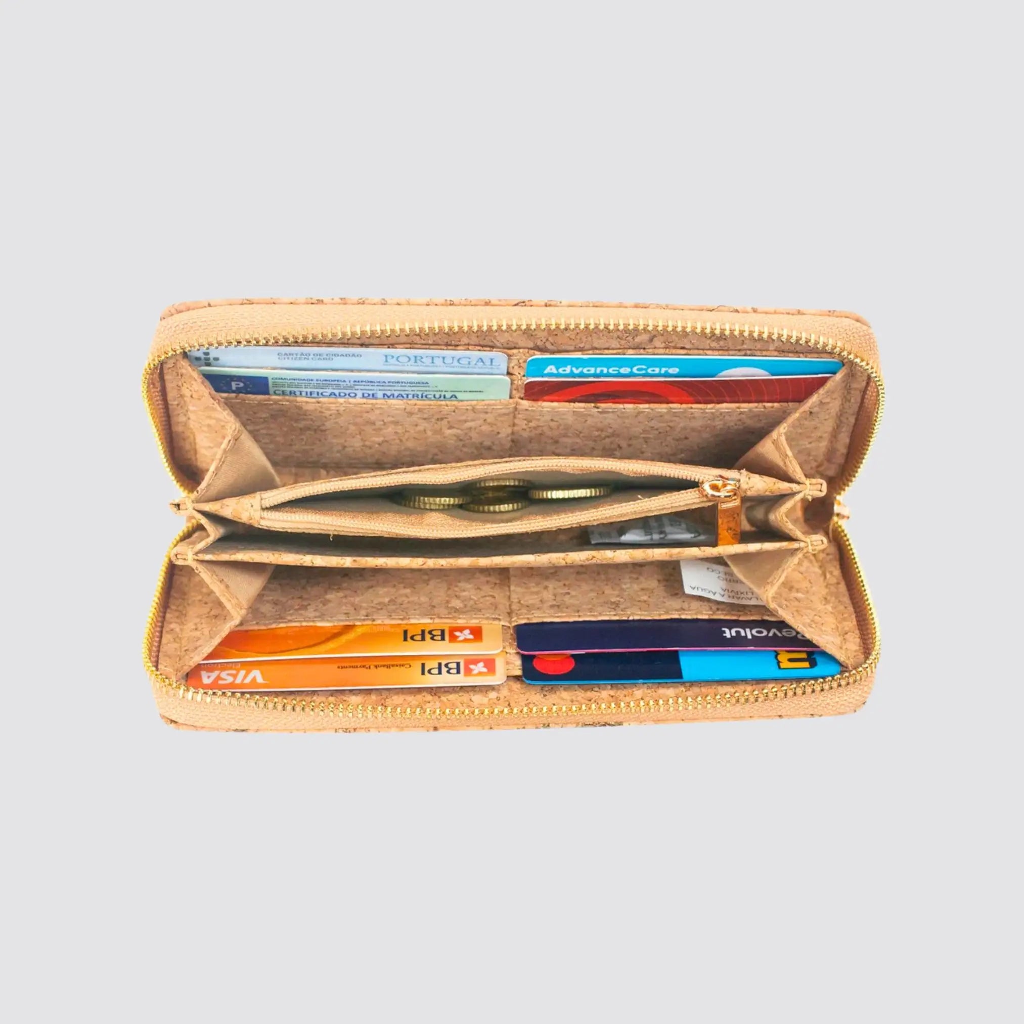 Stylish golden cork zipper wallet with slots for bank cards and cash.