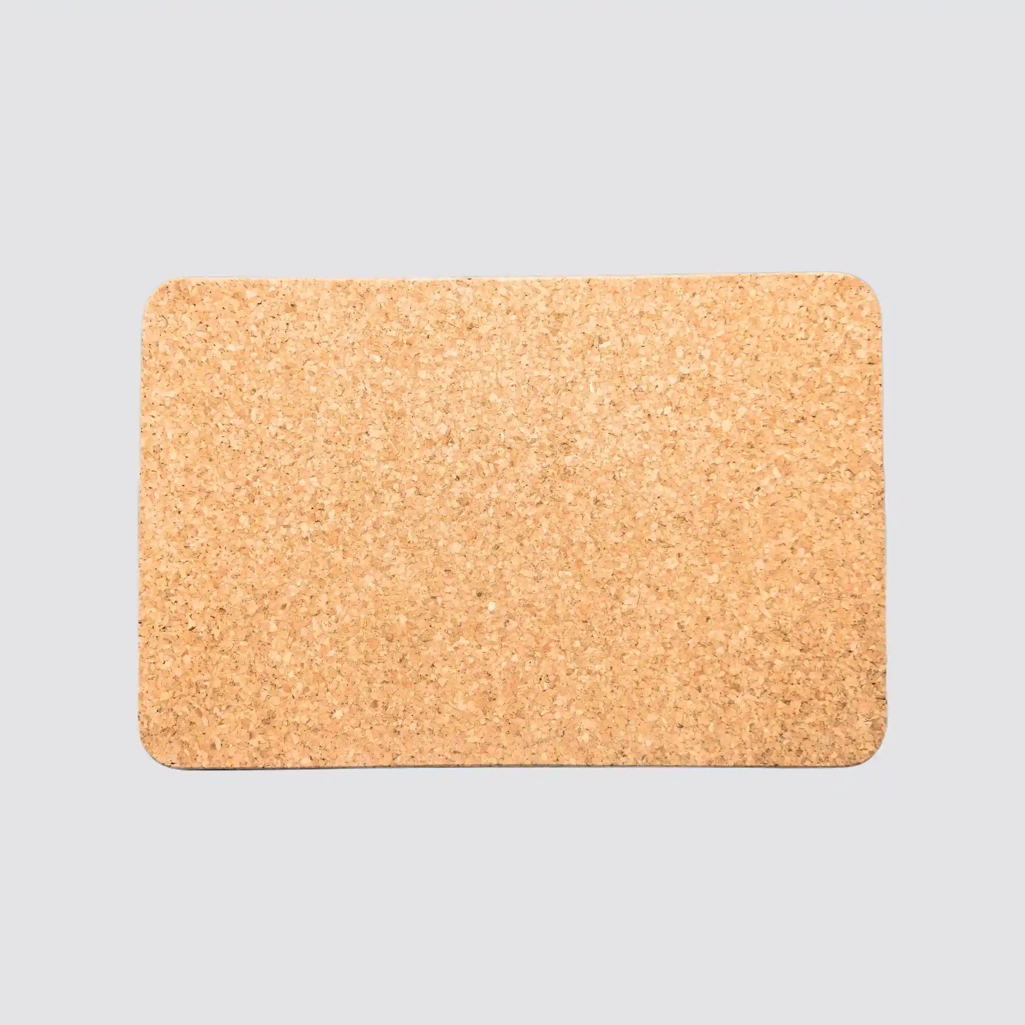 Stylish rectangular cork placemat for modern dining tables.