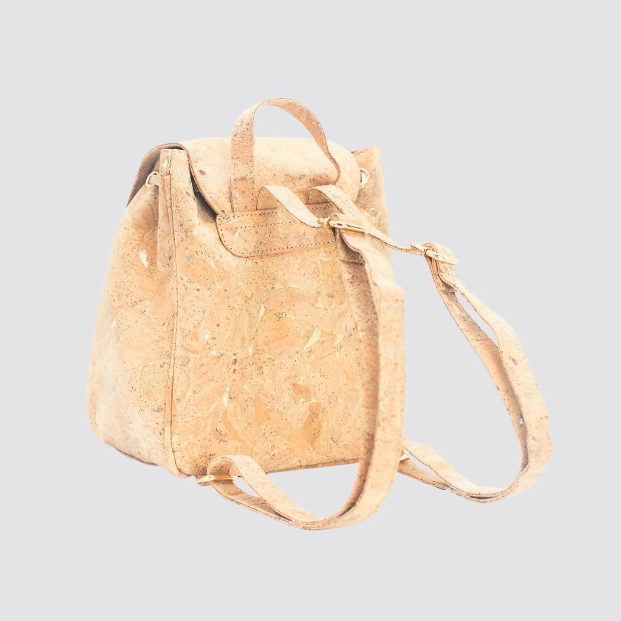 Stylish vegan cork backpack with adjustable straps and a magnetic pocket.