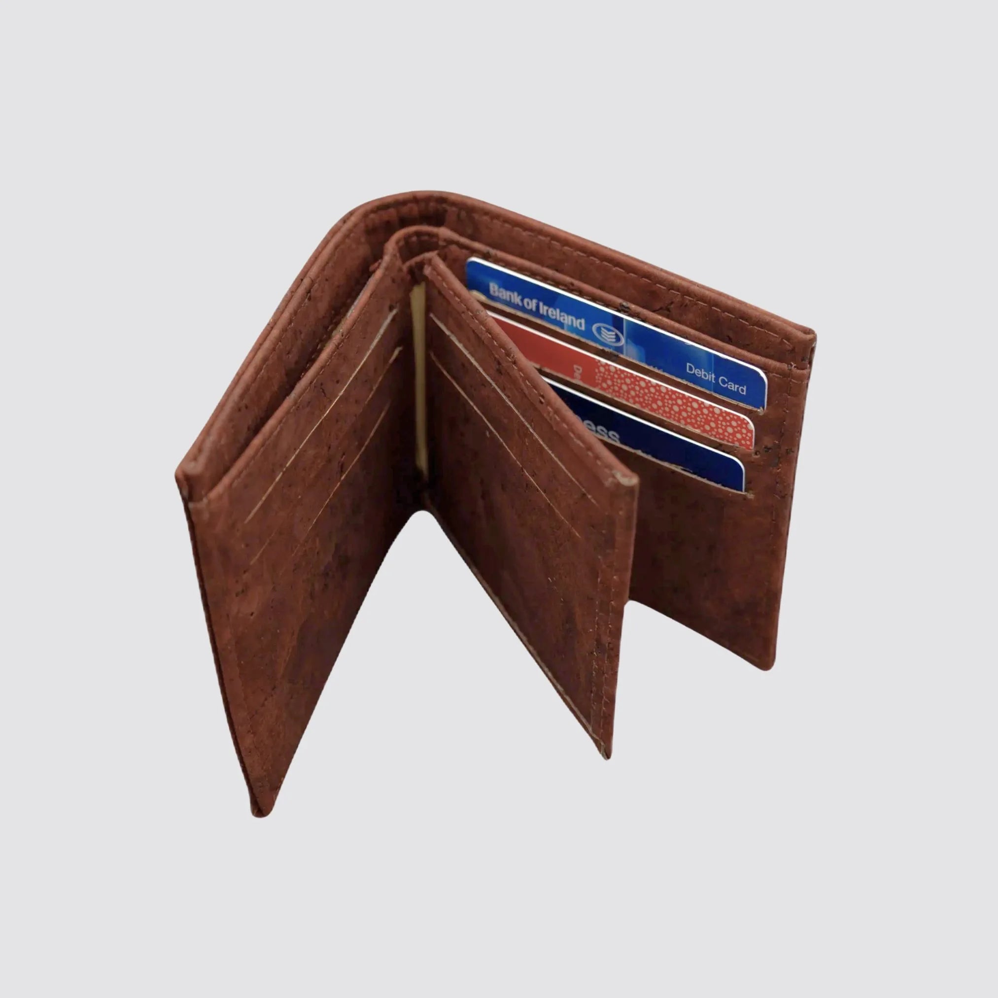 Sustainable brown cork wallet for men featuring 9 card slots, an ID slot, and 2 bill compartments.