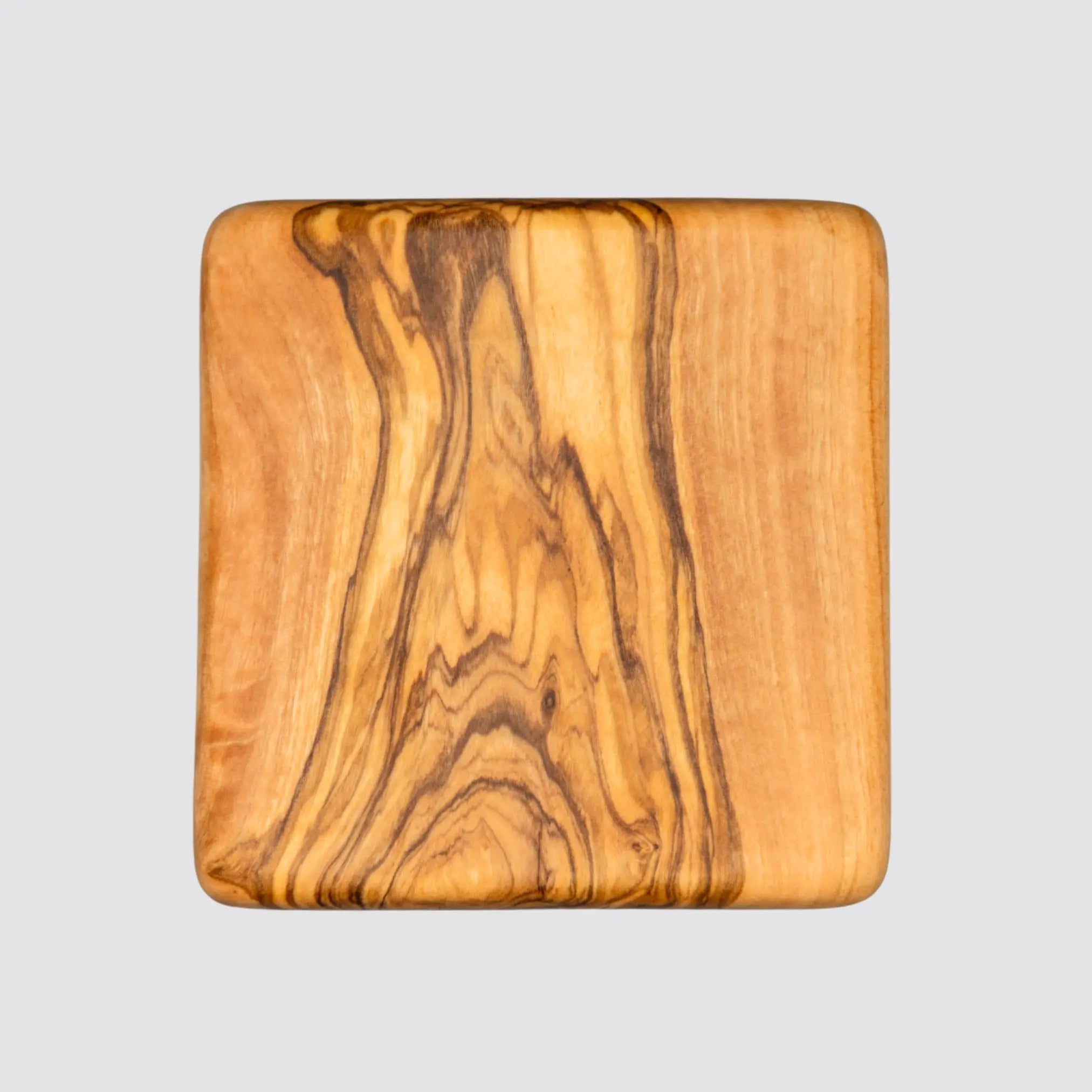 Sustainable olive wood coaster for hot and cold drinks.