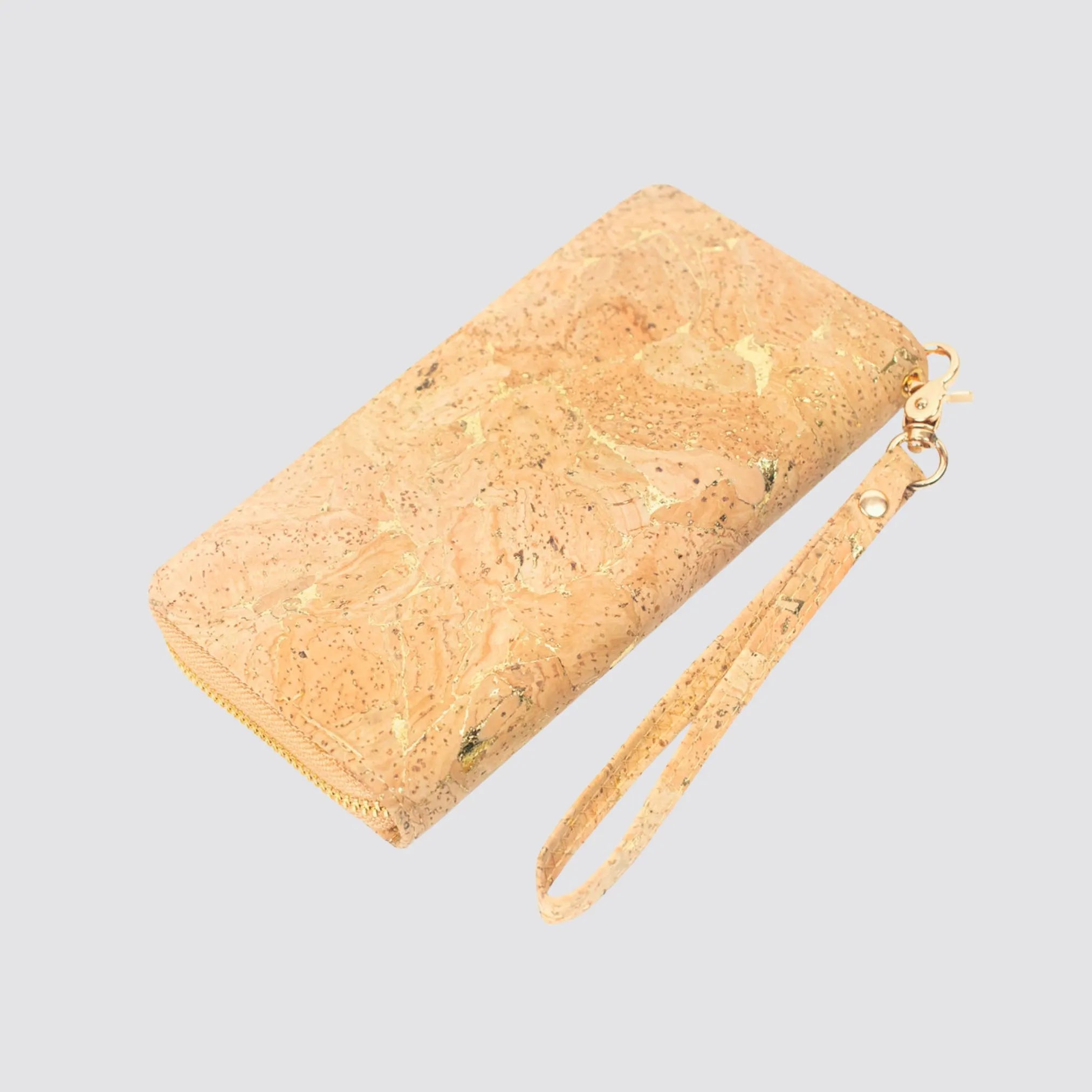 Sustainable vegan cork wallet with a detachable wrist strap and secure zip closure.
