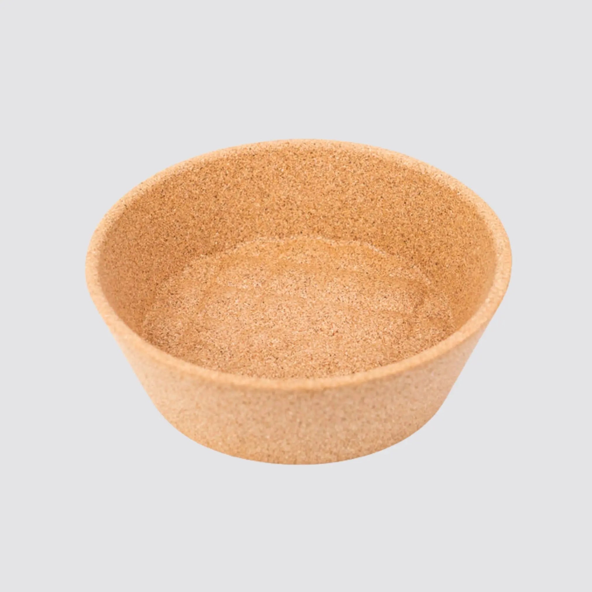 Elegant round cork bowl for serving treats and appetizers.