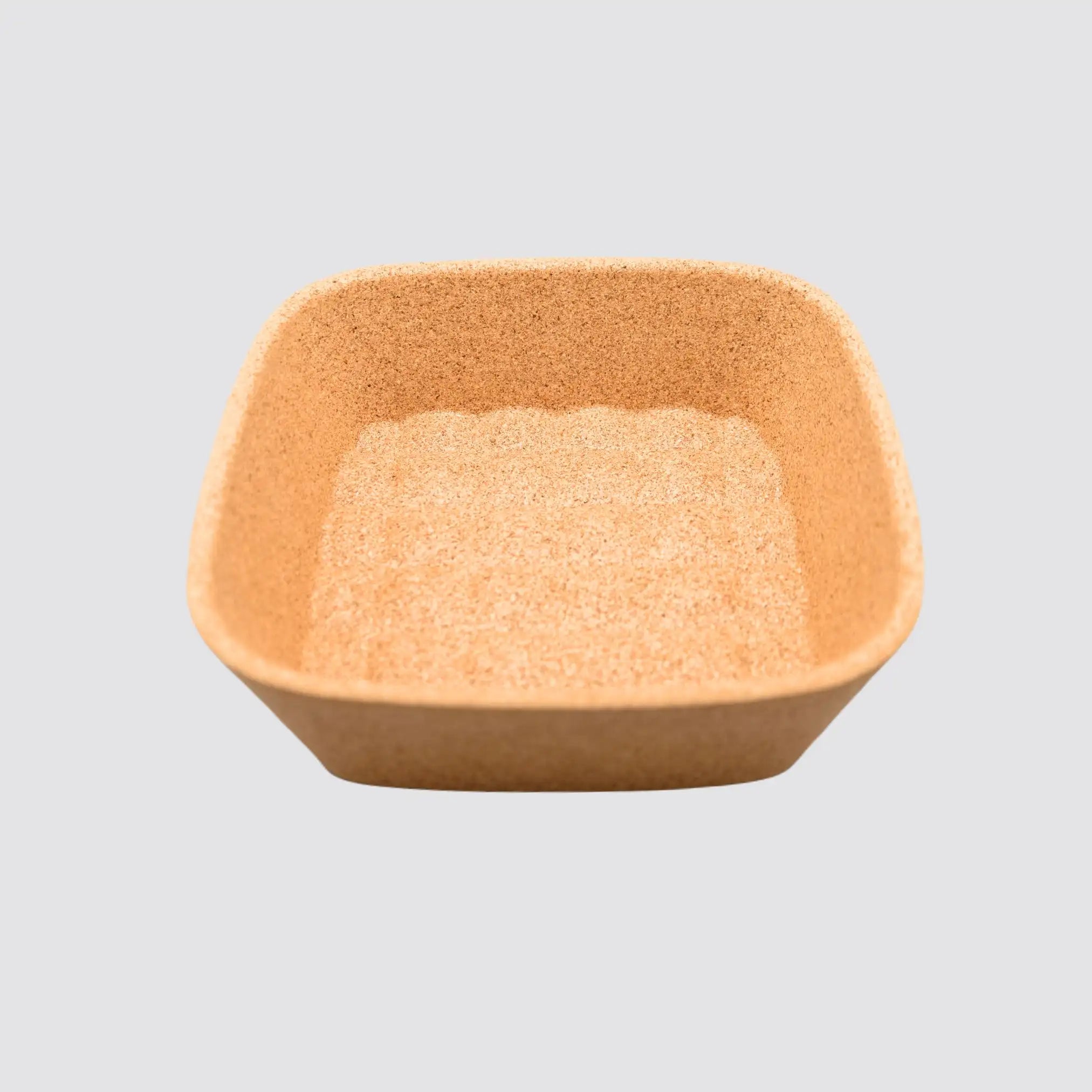 Versatile cork snack bowl for serving appetizers and treats.