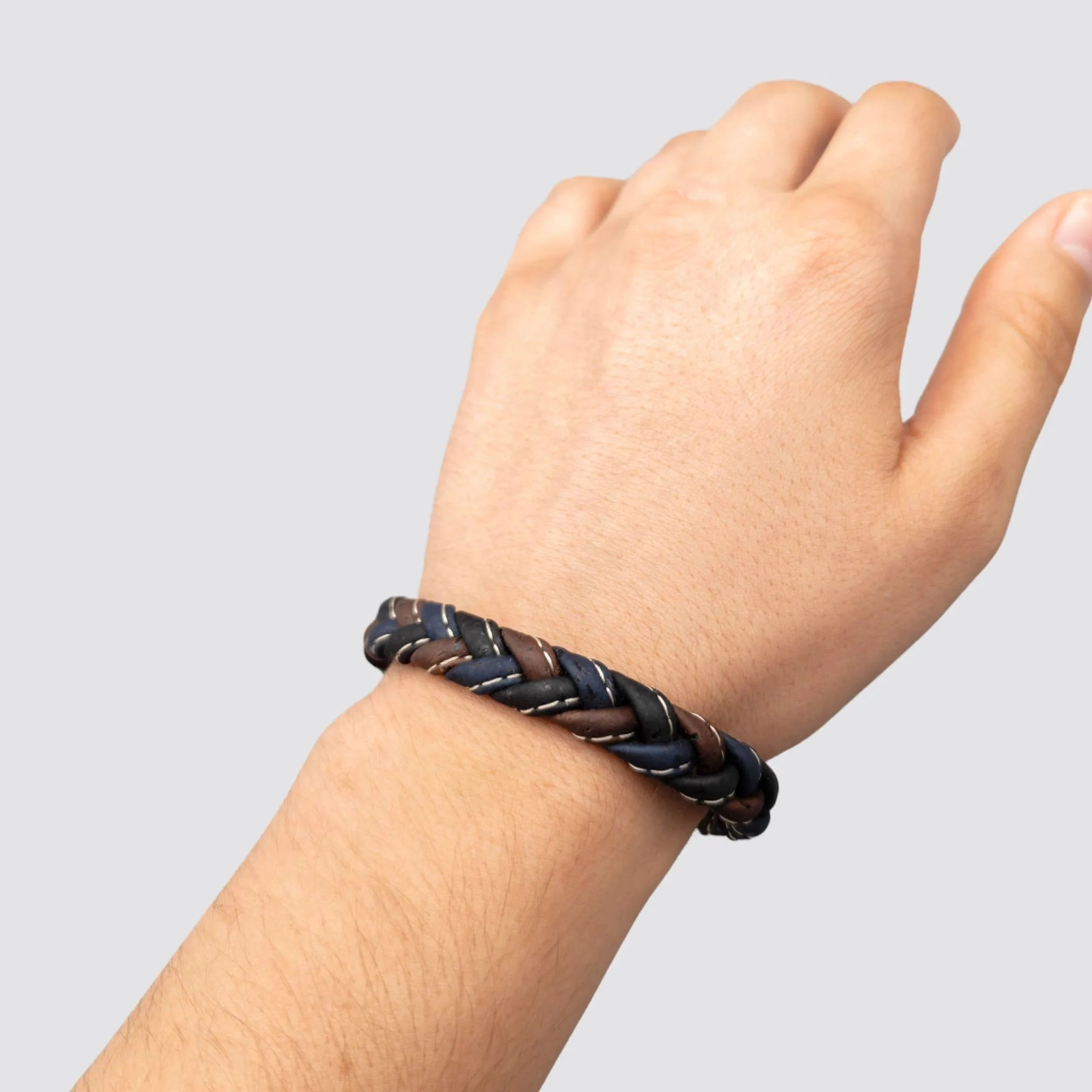 Vibrant Braided Cork Bracelet worn on the wrist, showcasing its colorful design and sustainable material, in a lifestyle setting.