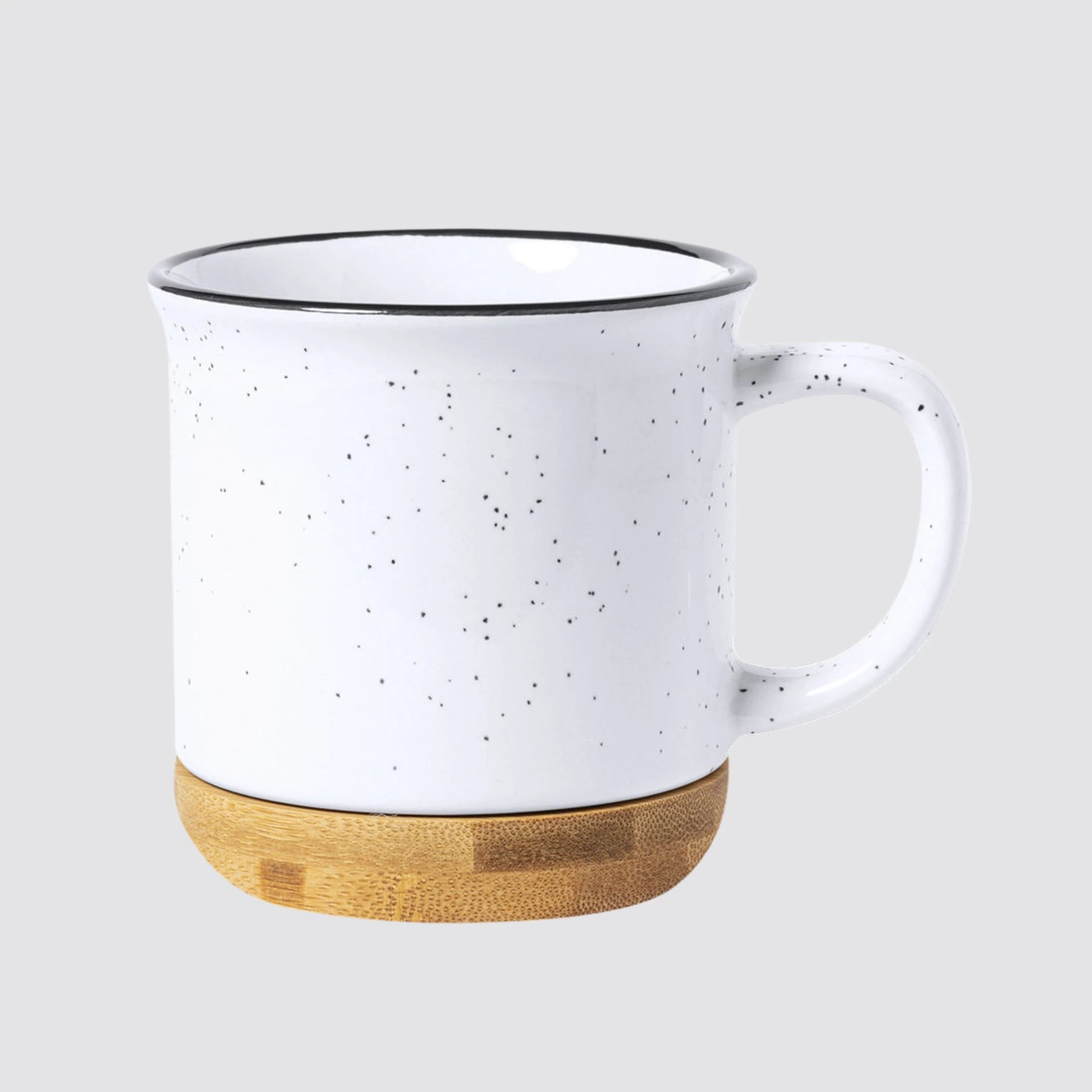Front view of a vintage ceramic mug with a bamboo base, showcasing its white speckled finish and elegant black rim on a plain background.