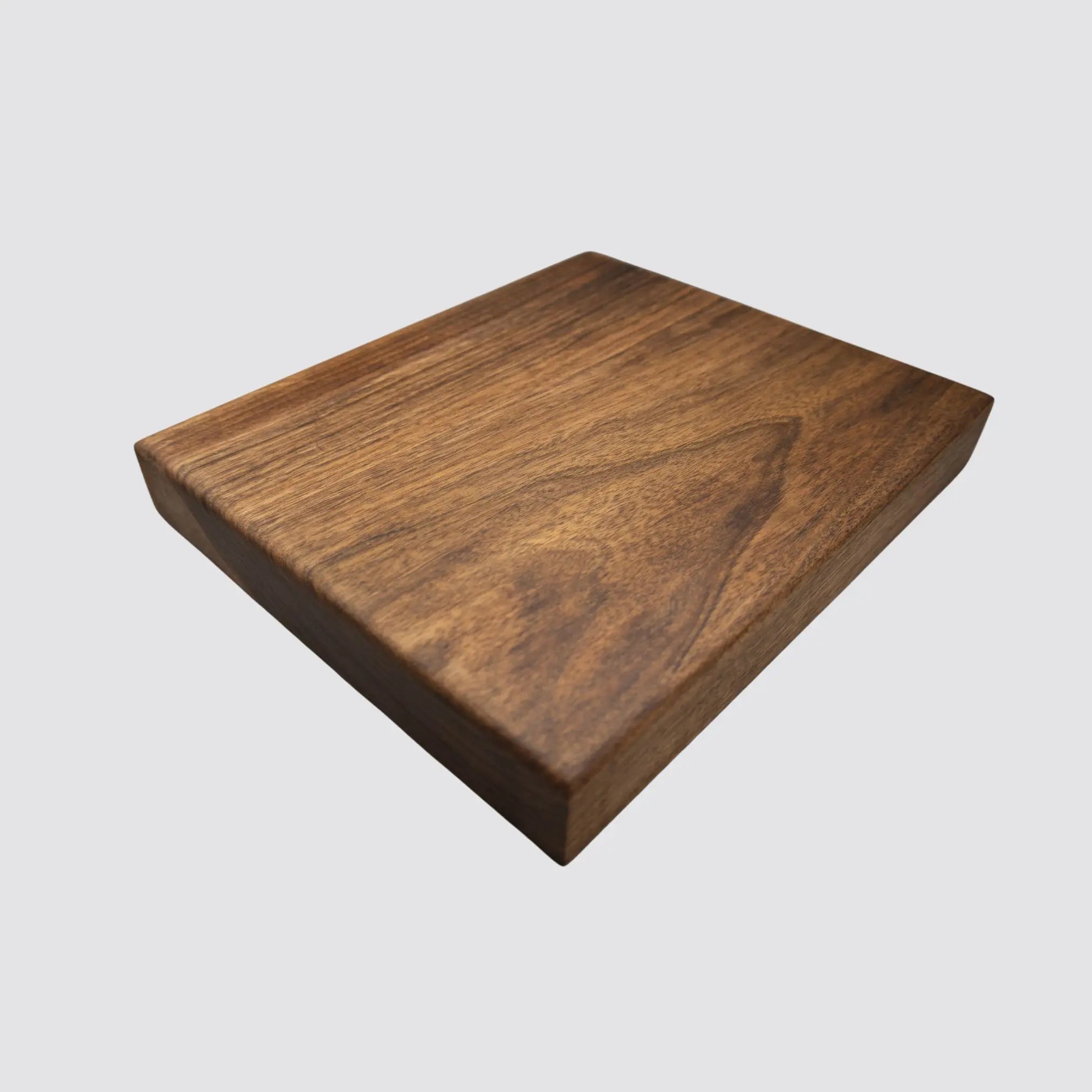Versatile walnut butcher block suitable for chopping, slicing, and dicing.
