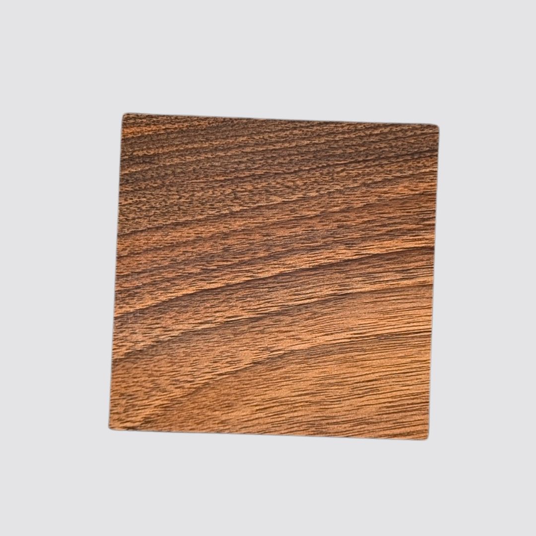 The wood coaster made of walnut is an elegant option for serving drinks.